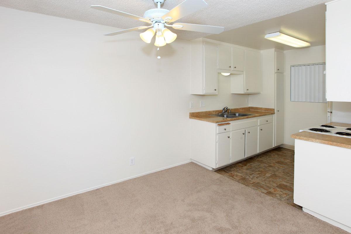 a large white refrigerator in a small room
