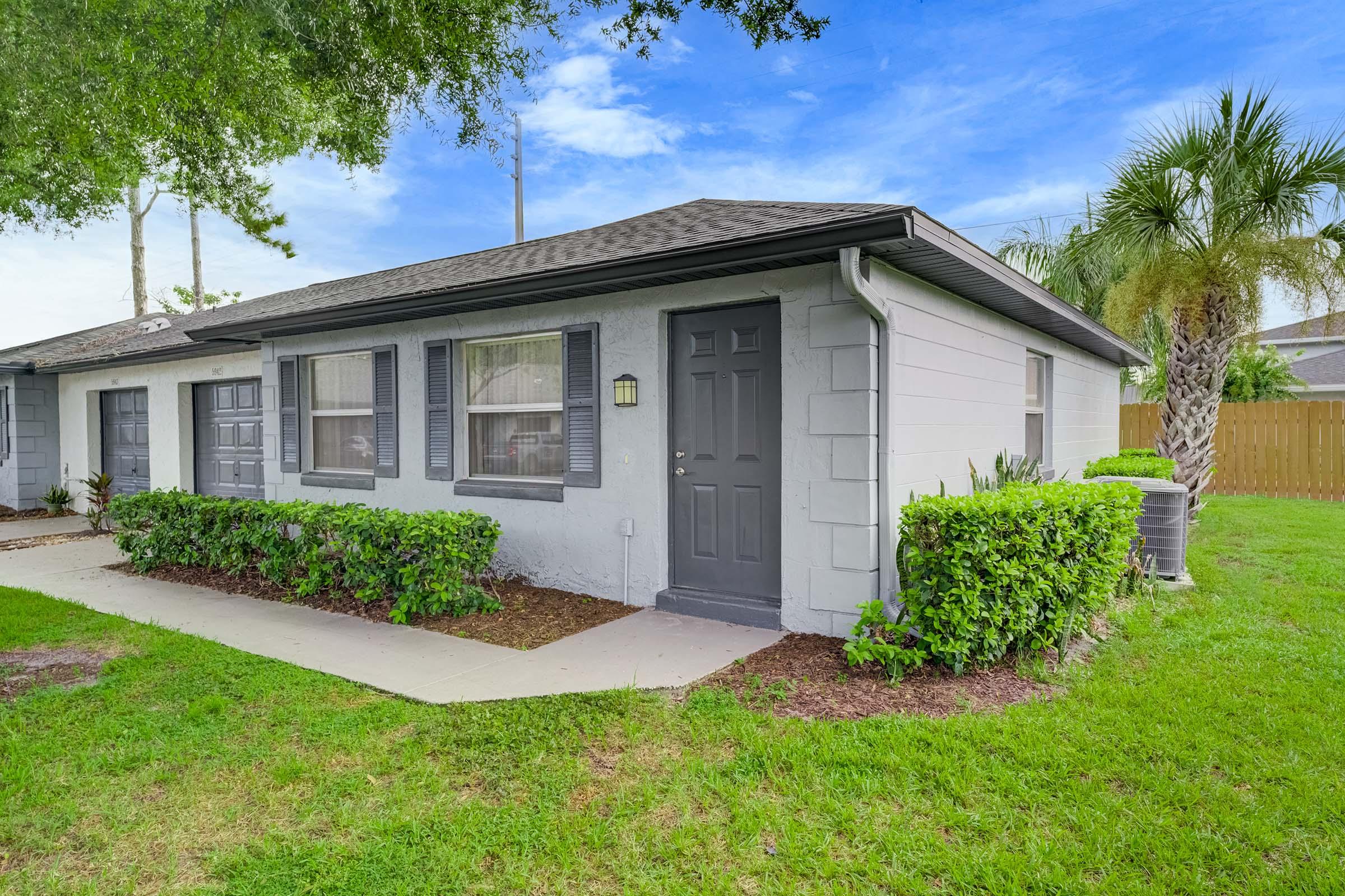 a large lawn in front of a house