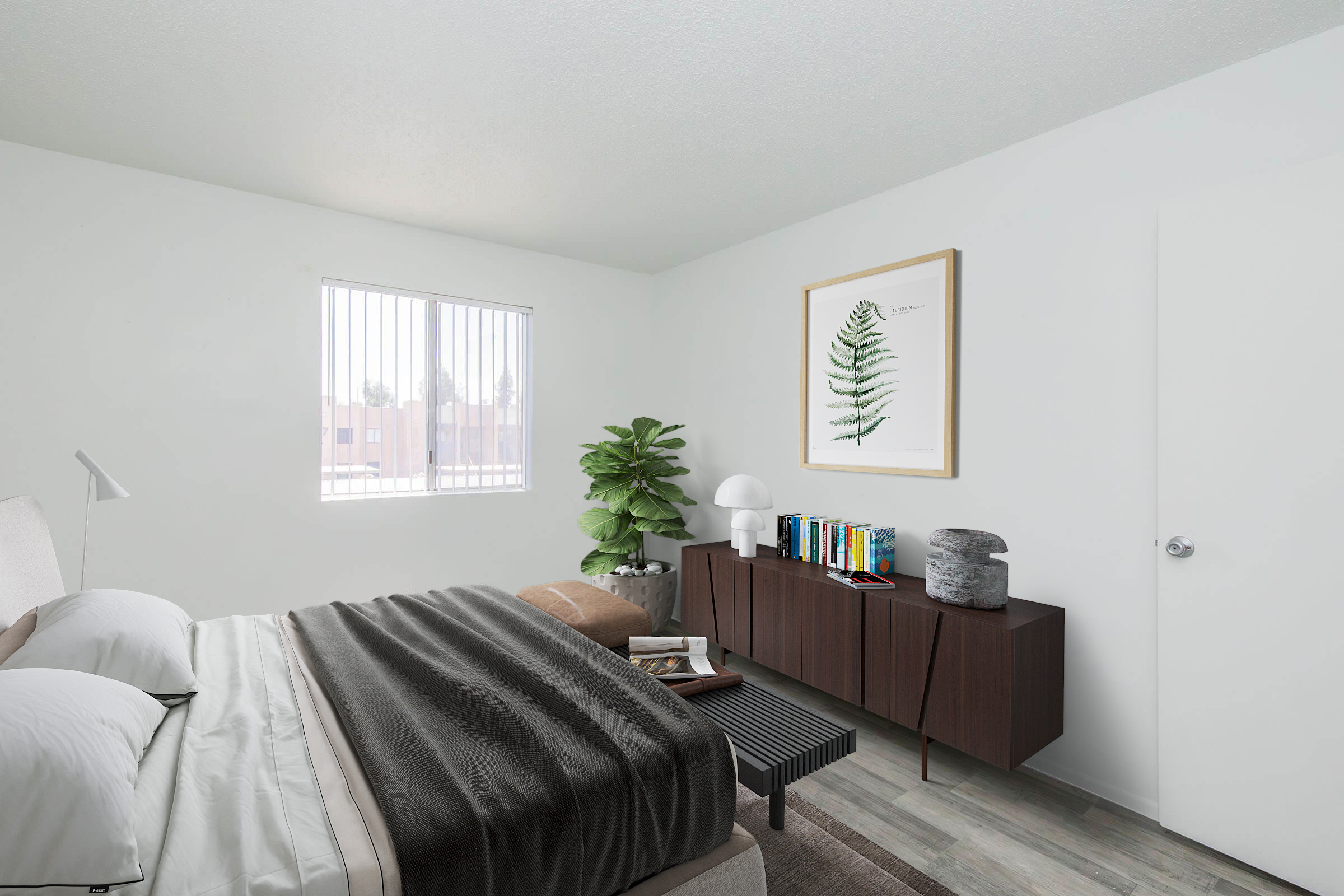 A modern bedroom featuring a large bed with gray bedding, a striped bench at the foot, a stylish wooden dresser with books and decorative items, a potted plant, and a framed botanical print on the wall. Natural light enters through a window with vertical blinds, enhancing the warm and inviting atmosphere.