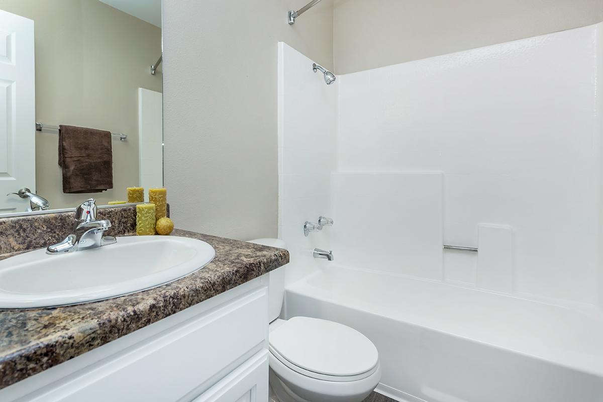 Bathroom with white cabinets