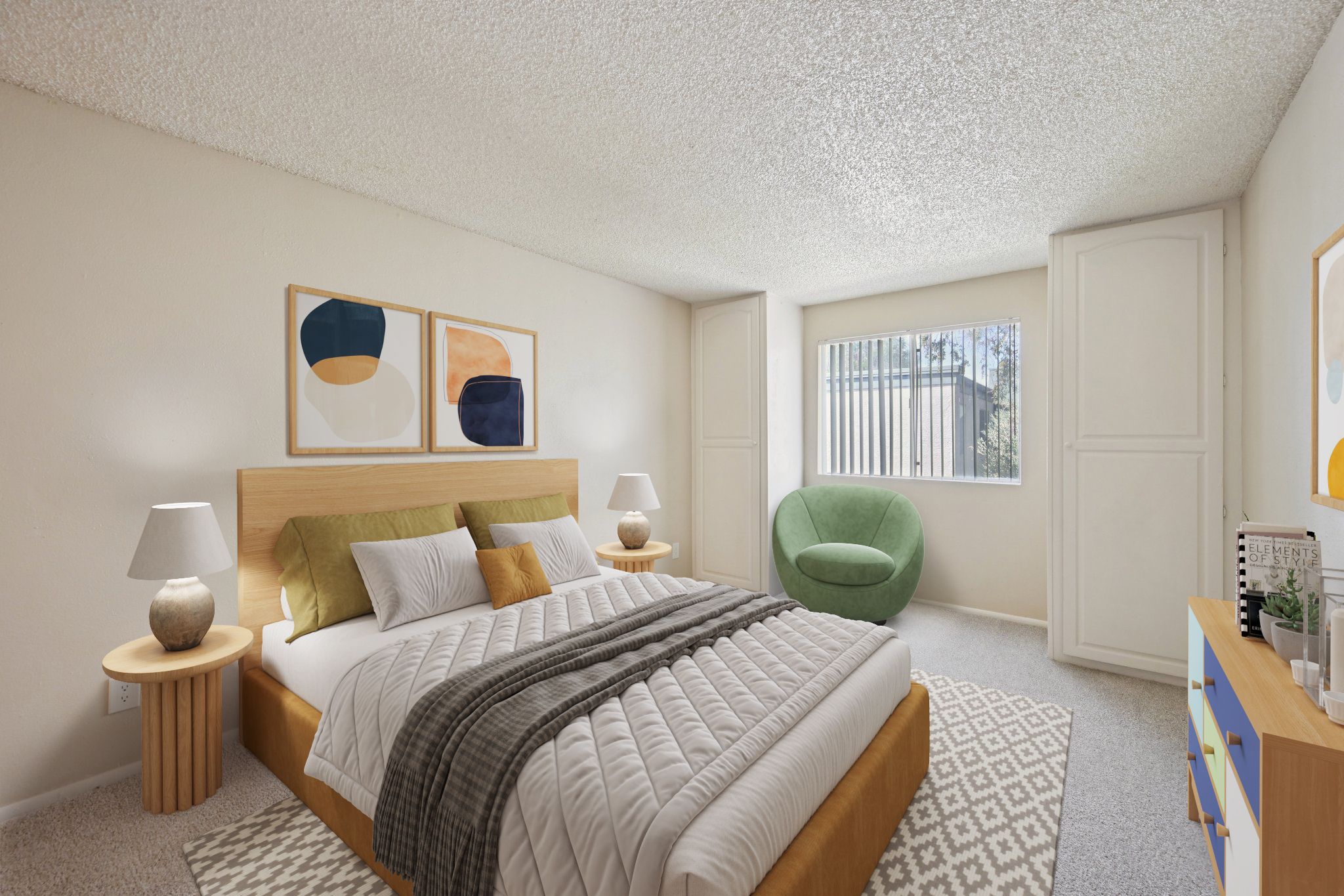 A cozy bedroom featuring a queen-sized bed with green and orange pillows, a textured white comforter, two bedside lamps, and modern artwork on the walls. A green armchair sits in the corner, and there’s a dresser with colorful drawers. Natural light filters through a window with blinds.