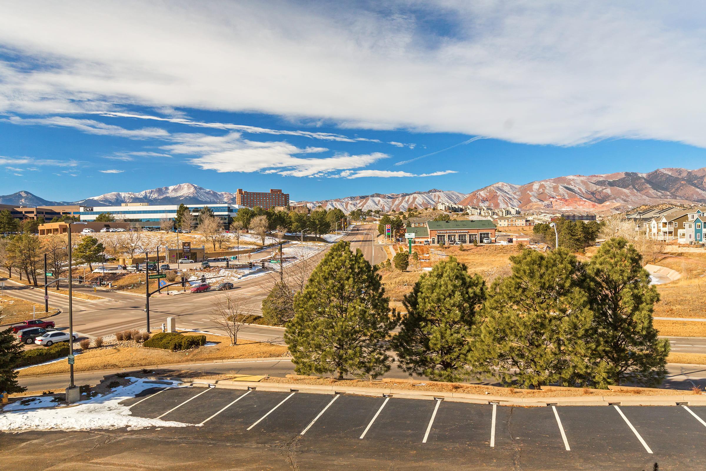 a view of a city with a mountain in the background