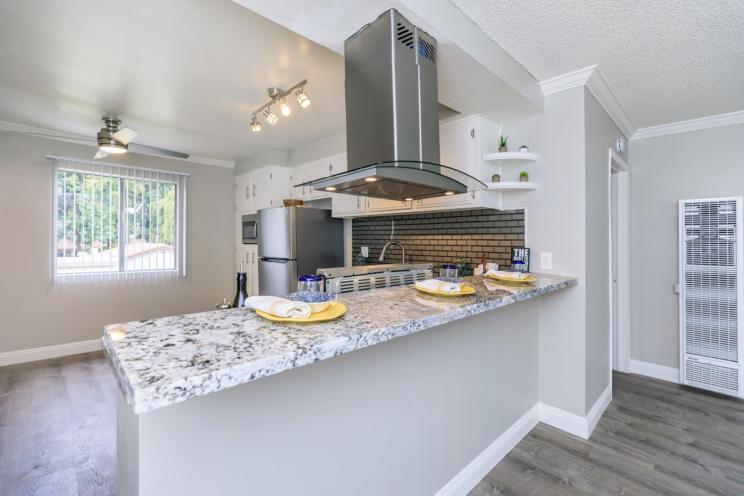 Kitchen with overhead exhaust