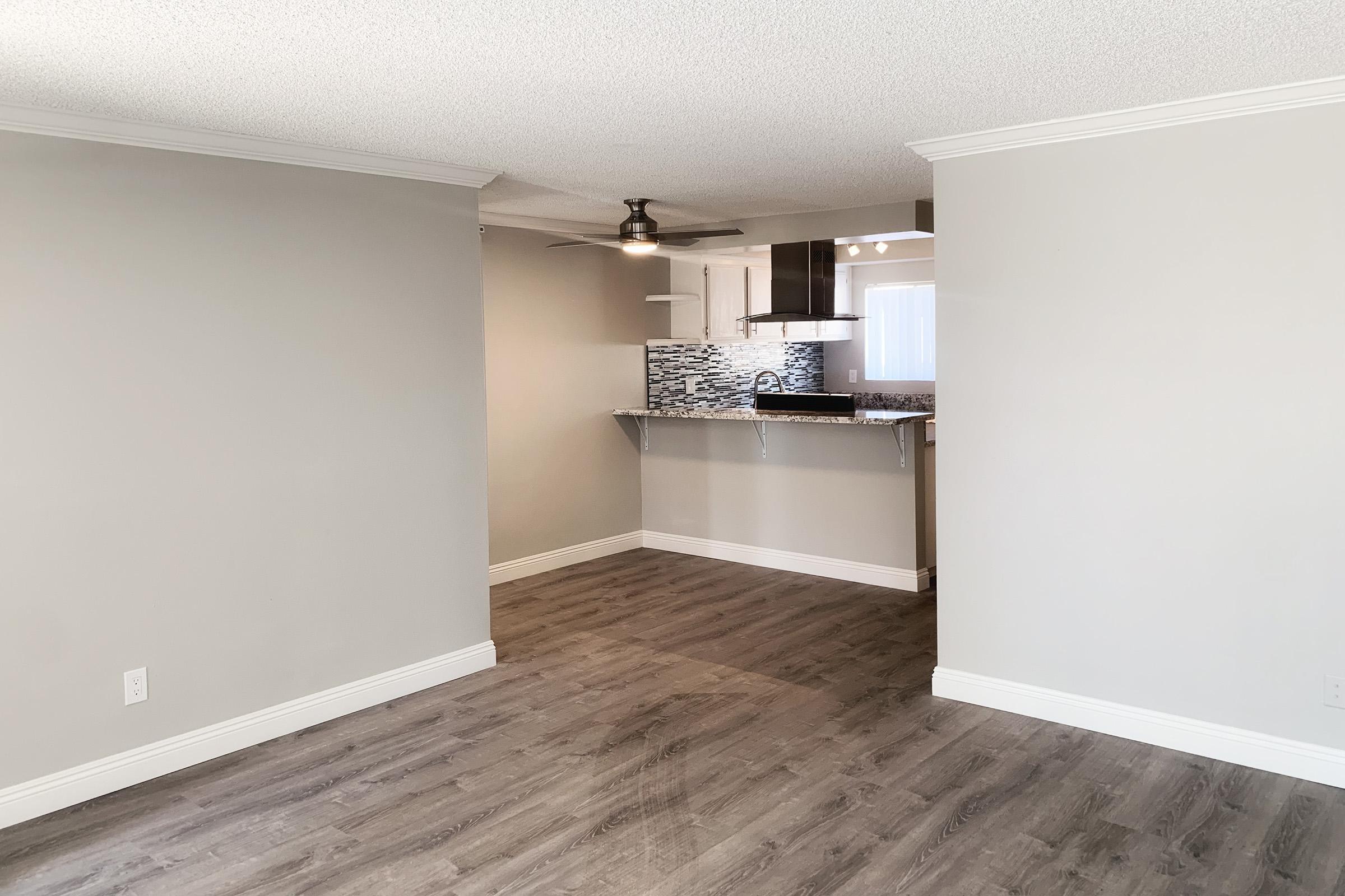 Dining room and living room with wooden floors