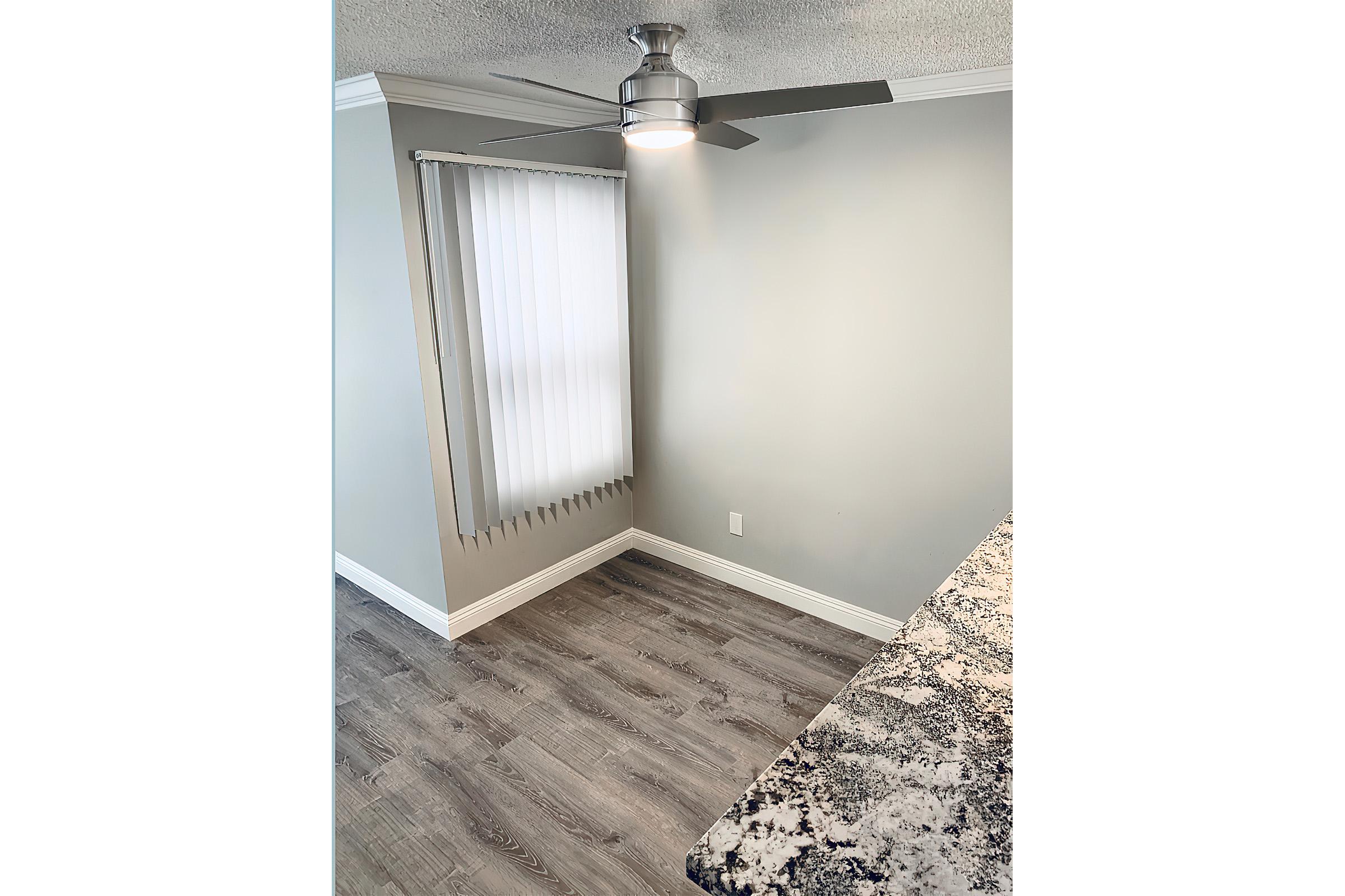 Dining room with white blinds