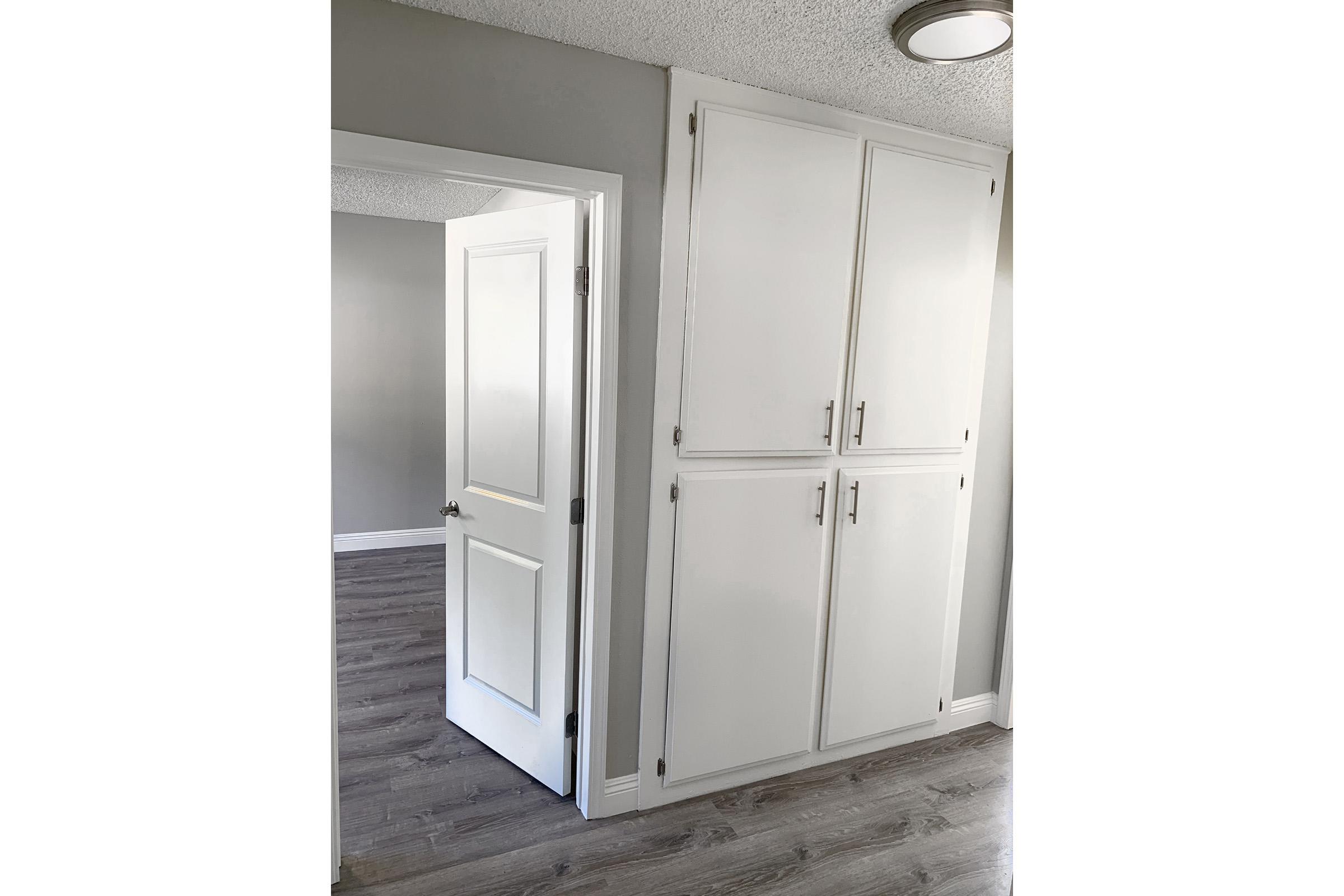 Bedroom and hallway with wooden floors