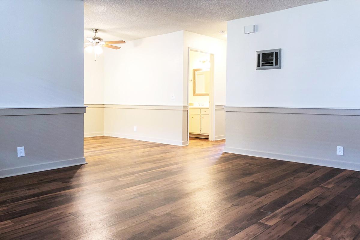 a kitchen with a wood floor