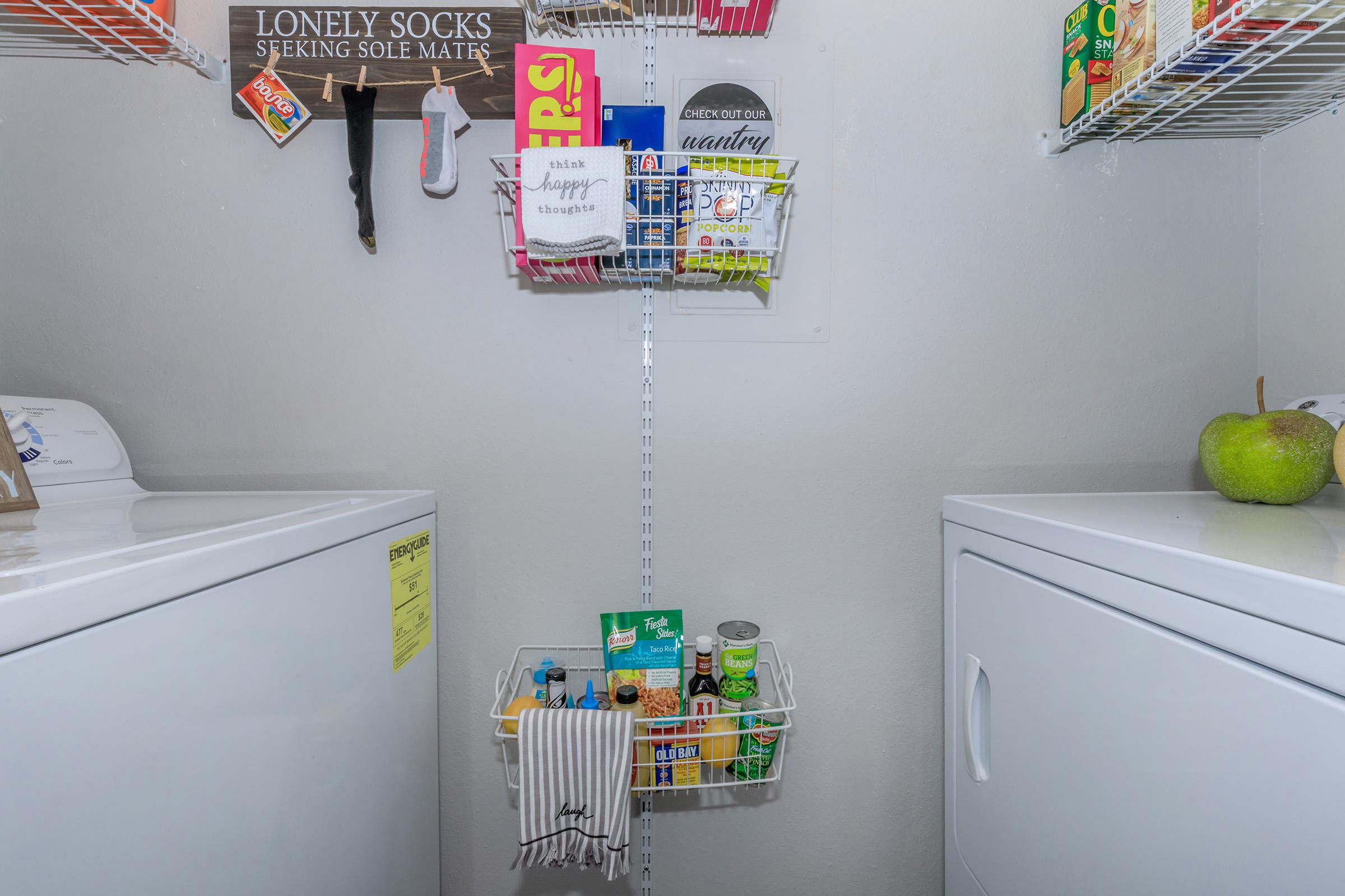 a kitchen with a sink and a refrigerator