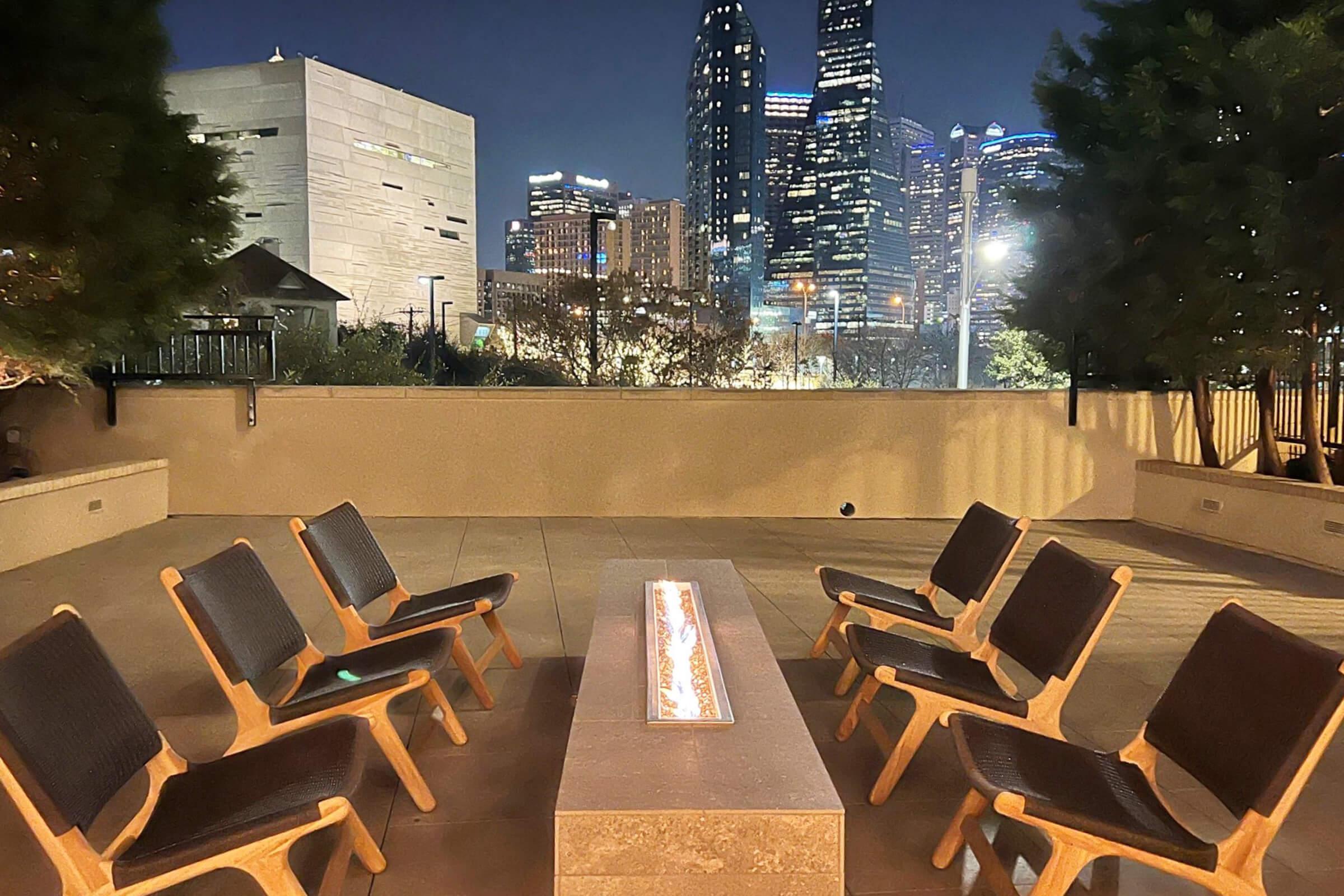fire pit and chairs at night