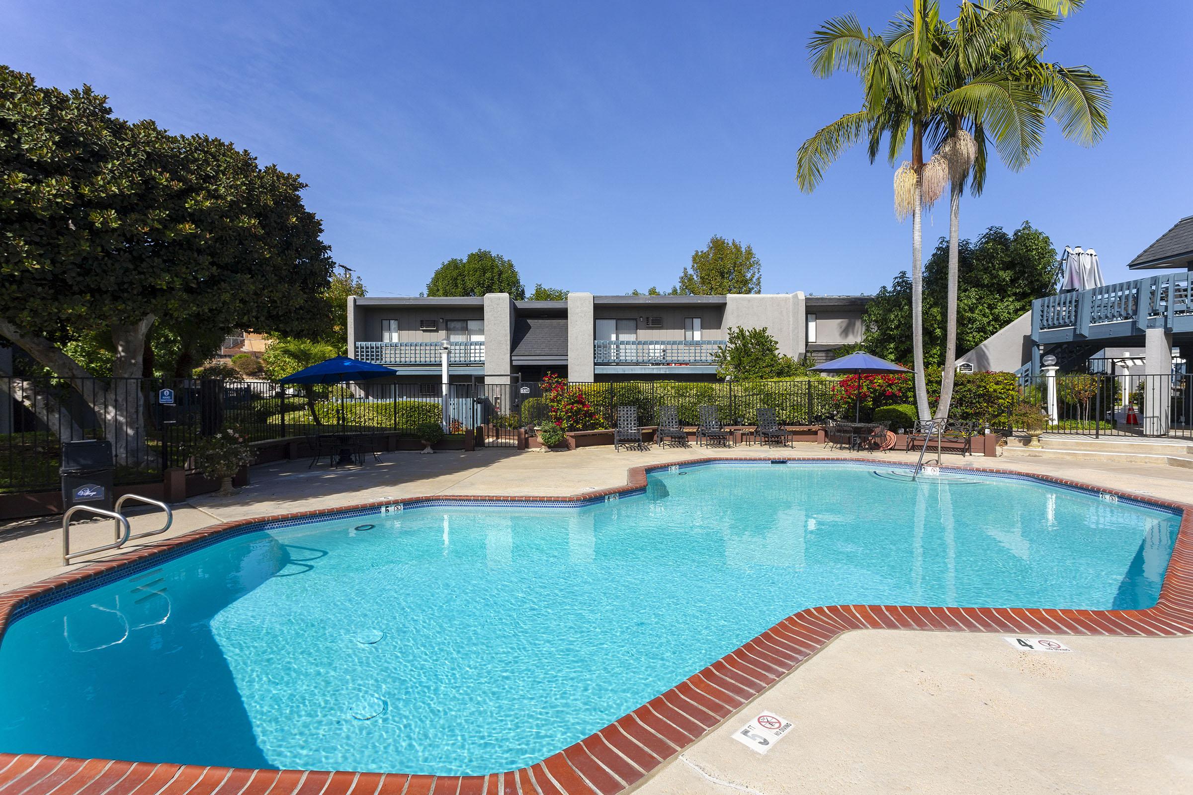 a pool next to a building