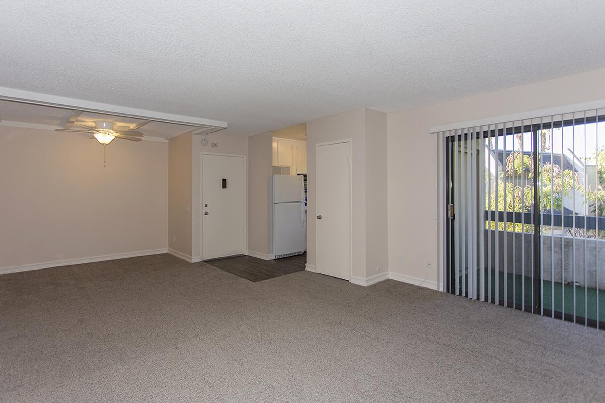 a bedroom with a bed in a room