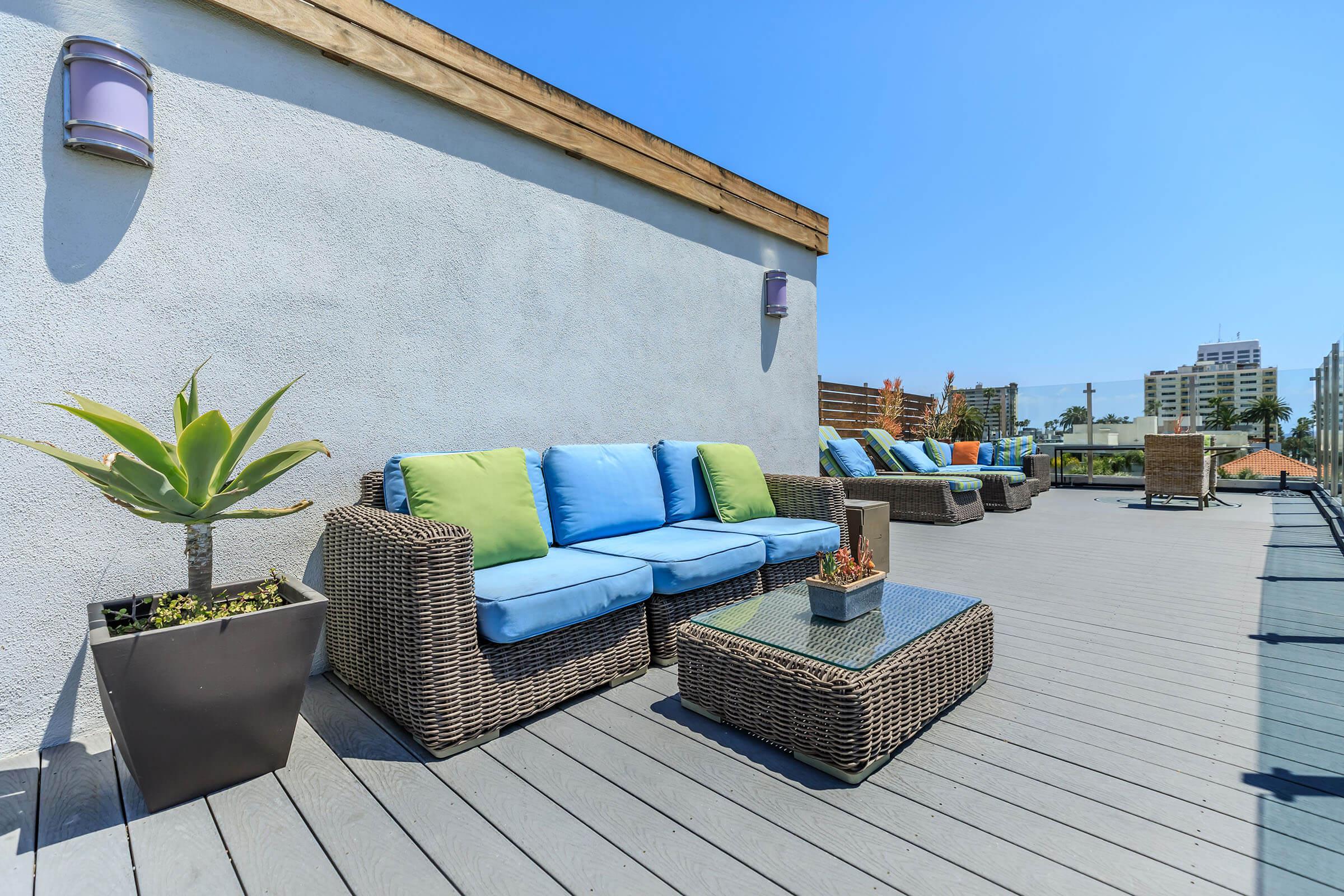 Wicker couches on rooftop