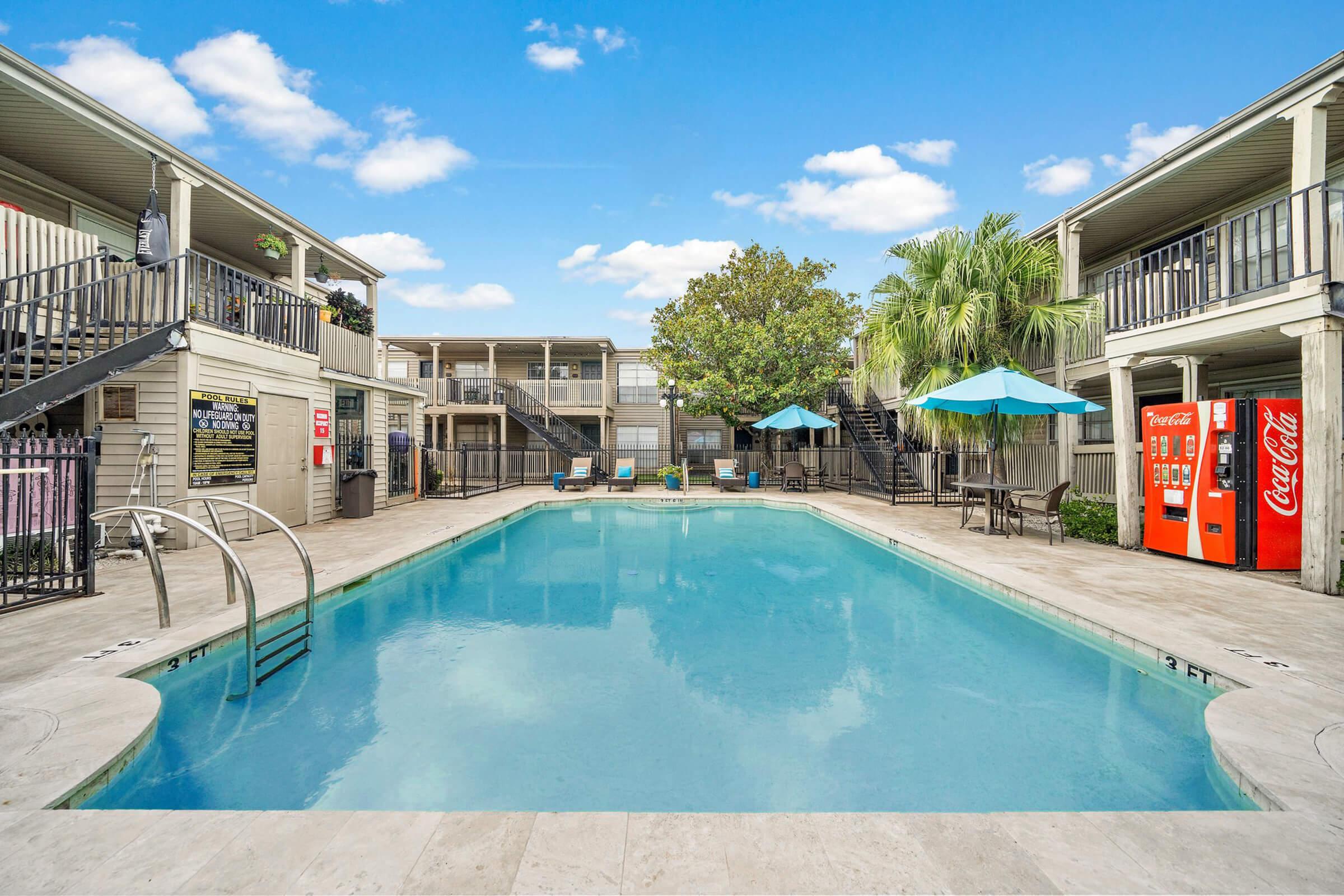 a pool next to a building