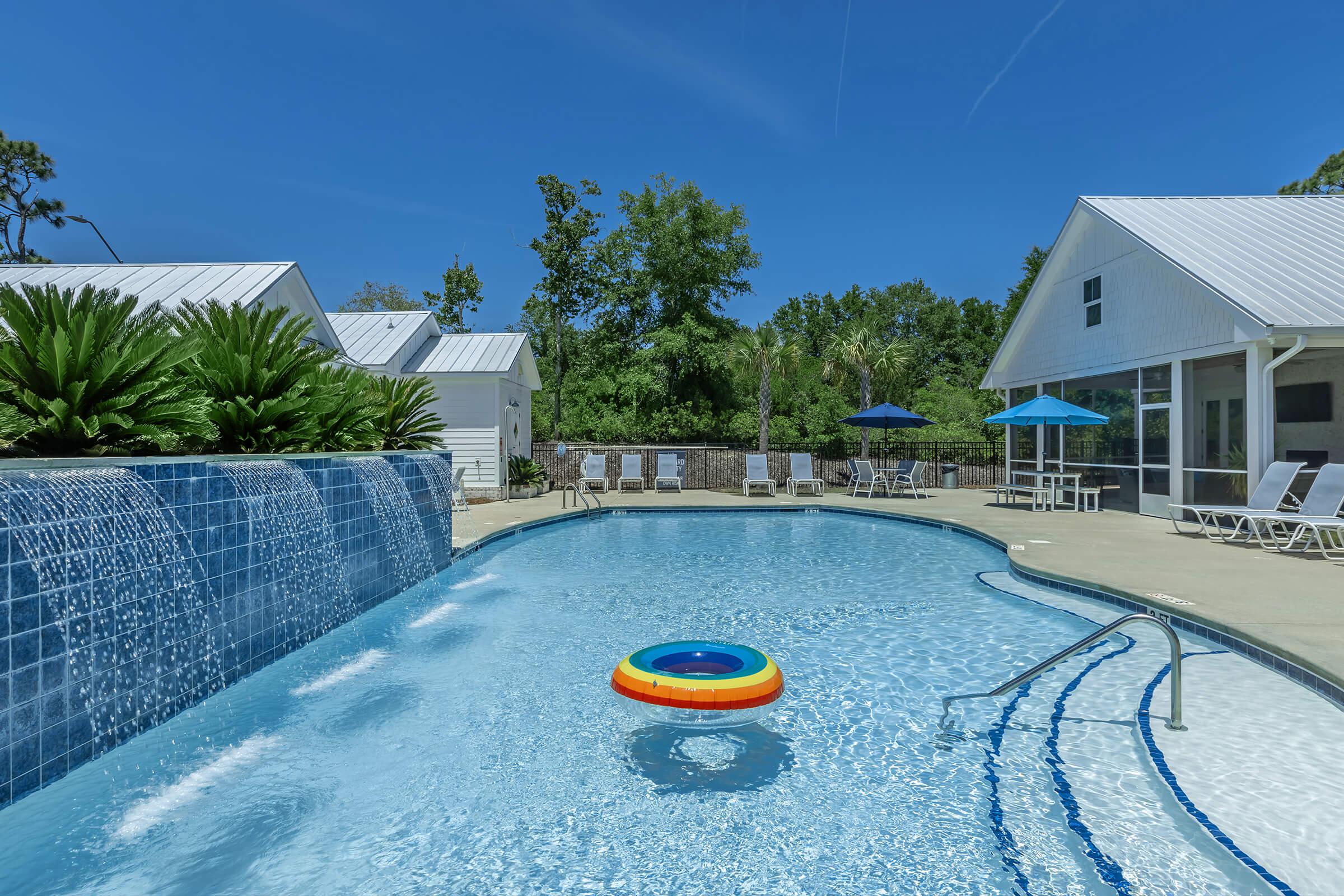 TAKE A DIP IN OUR SALTWATER POOL WITH WATERFALL