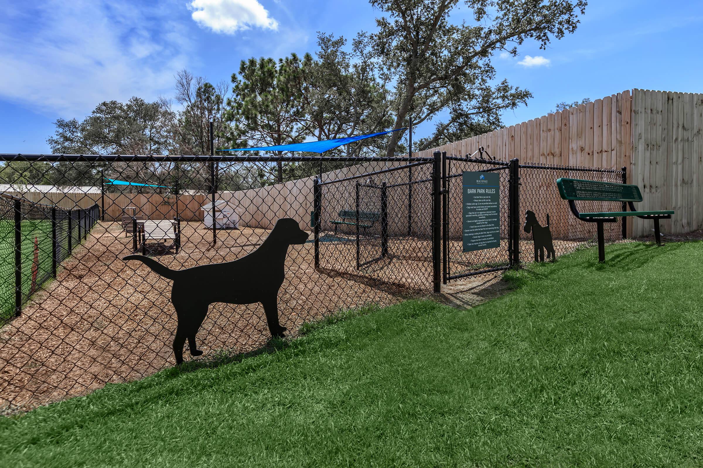 Dog park with agility equipment at The Townhomes at Beau Rivage in Wilmington, NC.