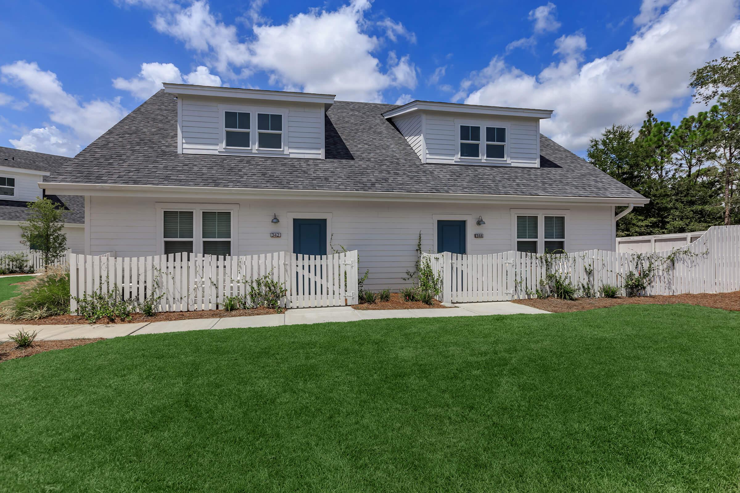 Private yards in select homes at The Townhomes at Beau Rivage in Wilmington, North Carolina.