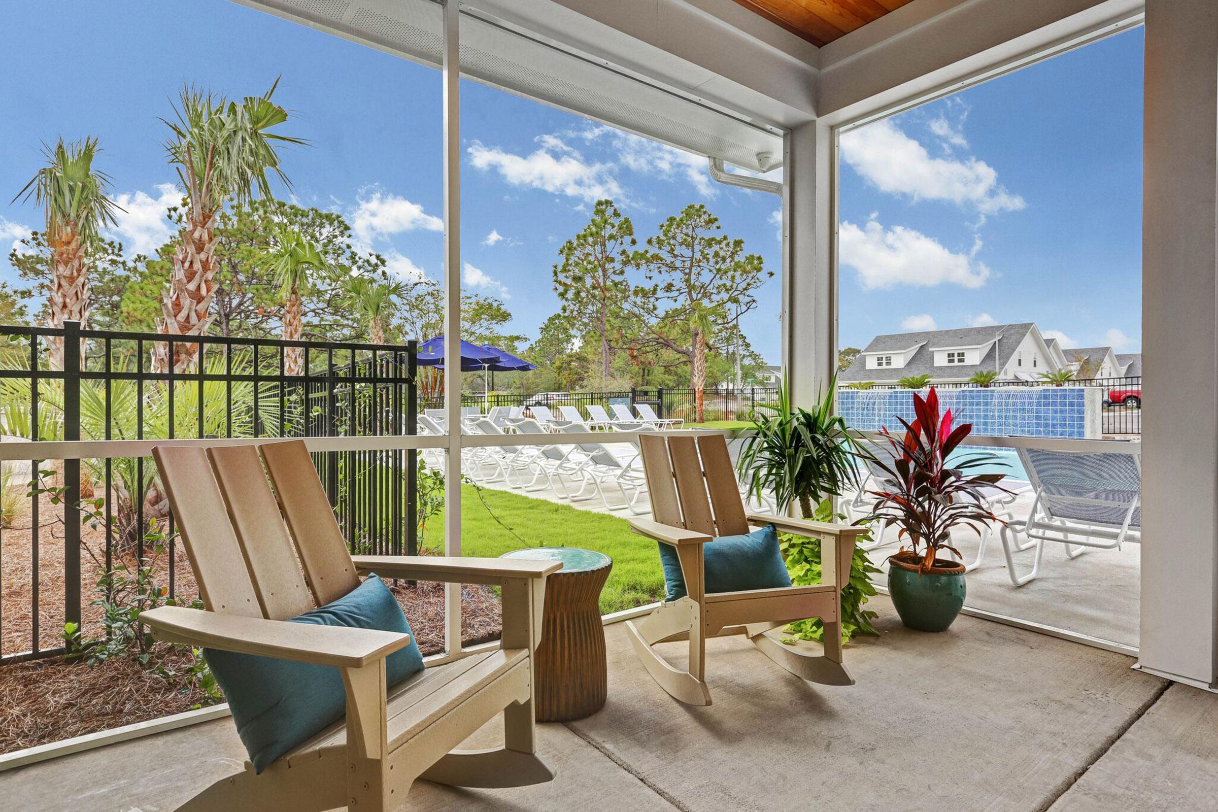 Relax outdoors at The Townhomes at Beau Rivage in Wilmington, North Carolina.
