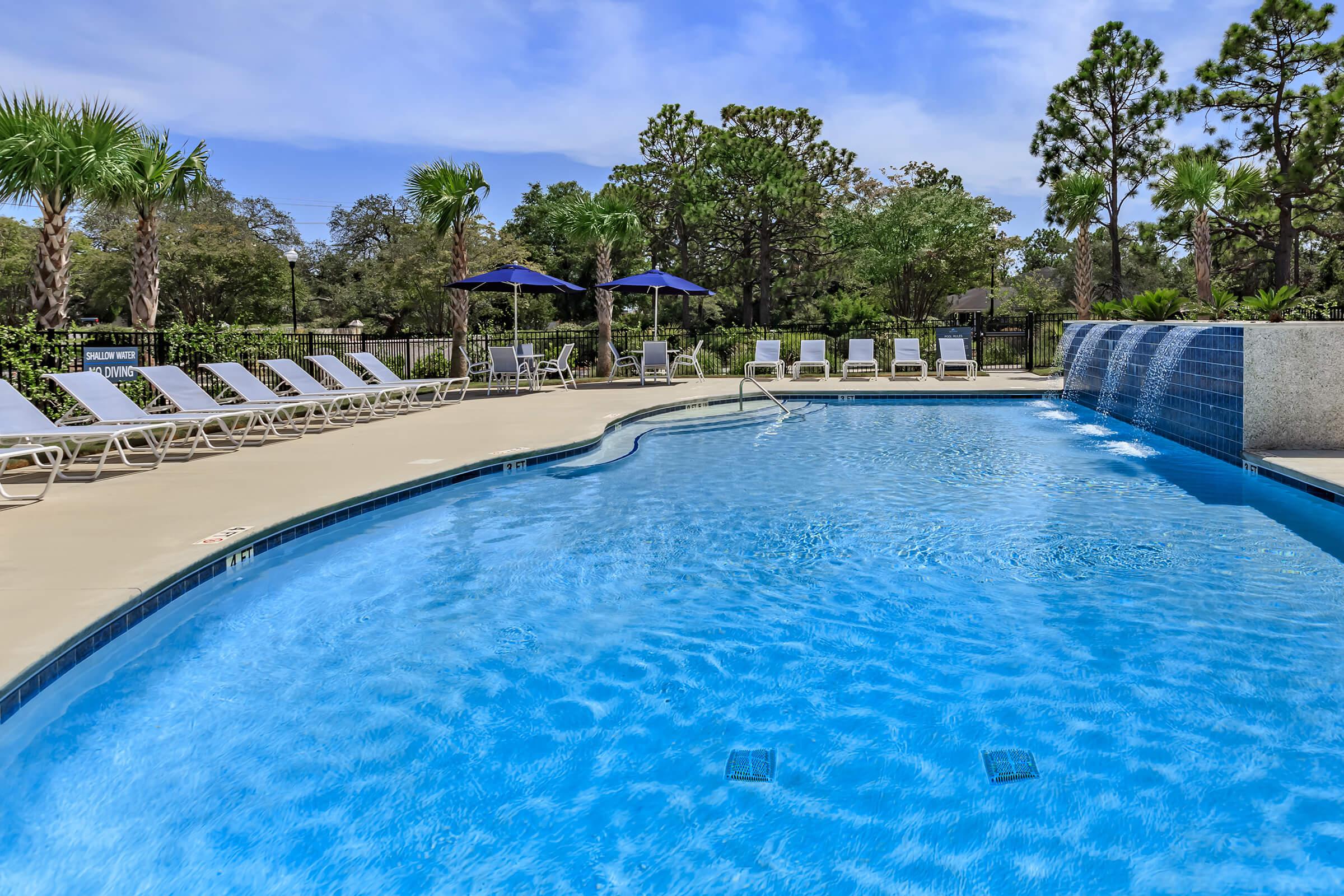 Shimmering swimming pool at The Townhomes at Beau Rivage in Wilmington, NC.