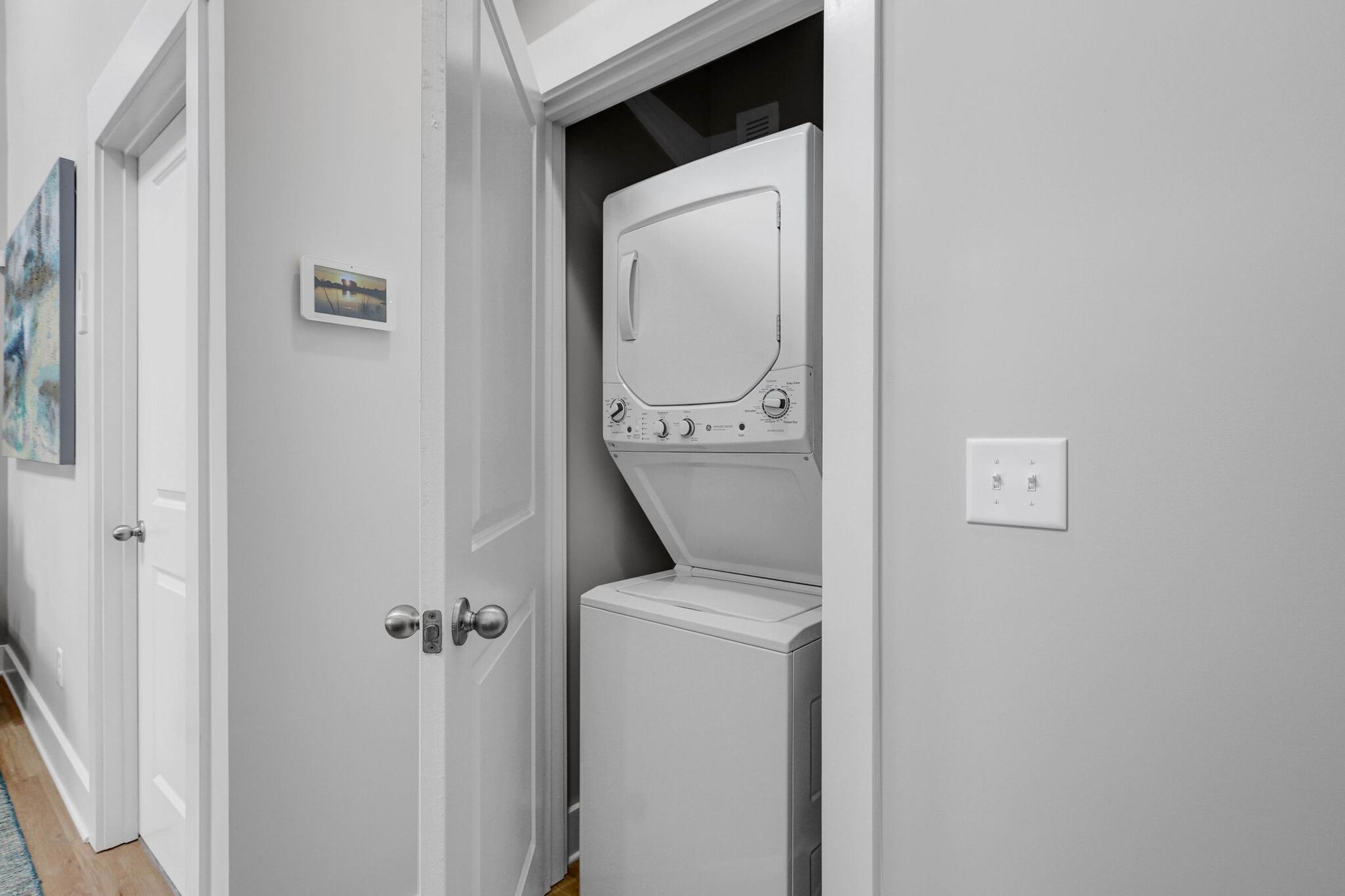 Washer and dryer units in home at The Townhomes at Beau Rivage in Wilmington, North Carolina.