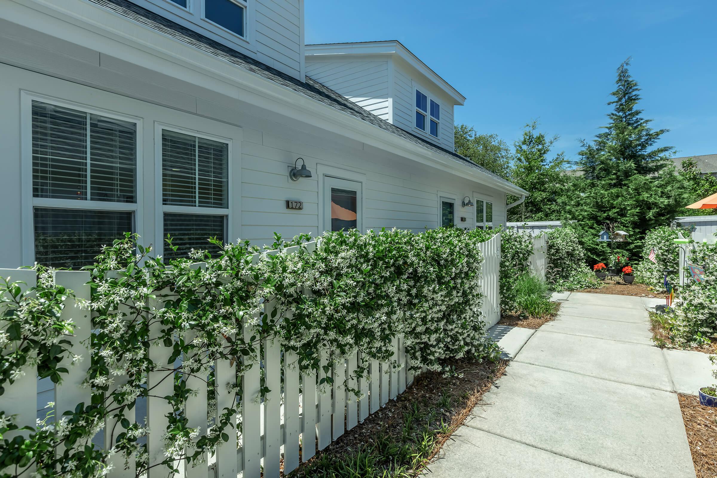 a house with trees in the background