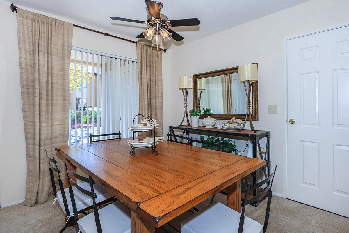 a room with a wooden table