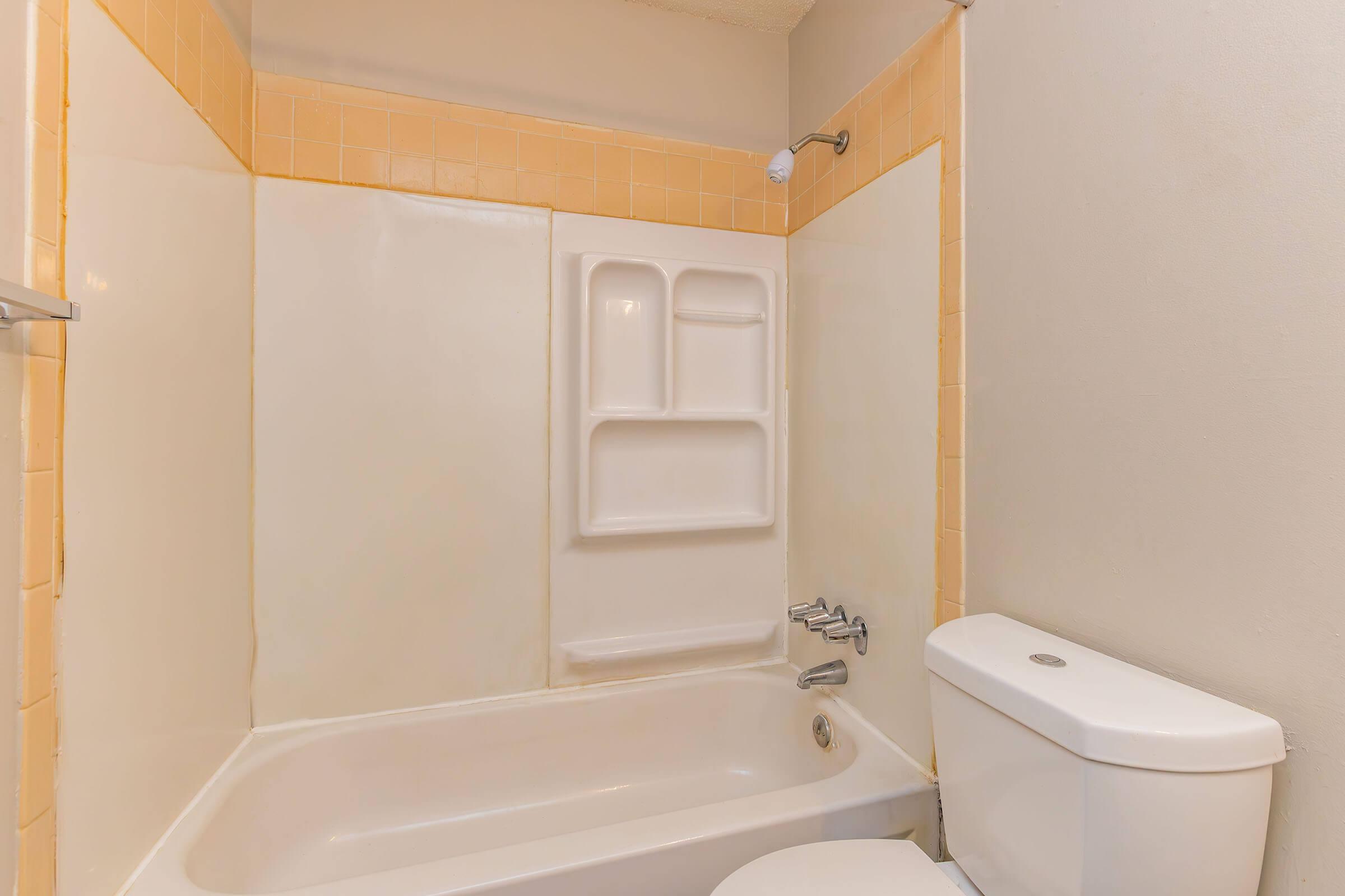 a close up of a sink and a bath tub