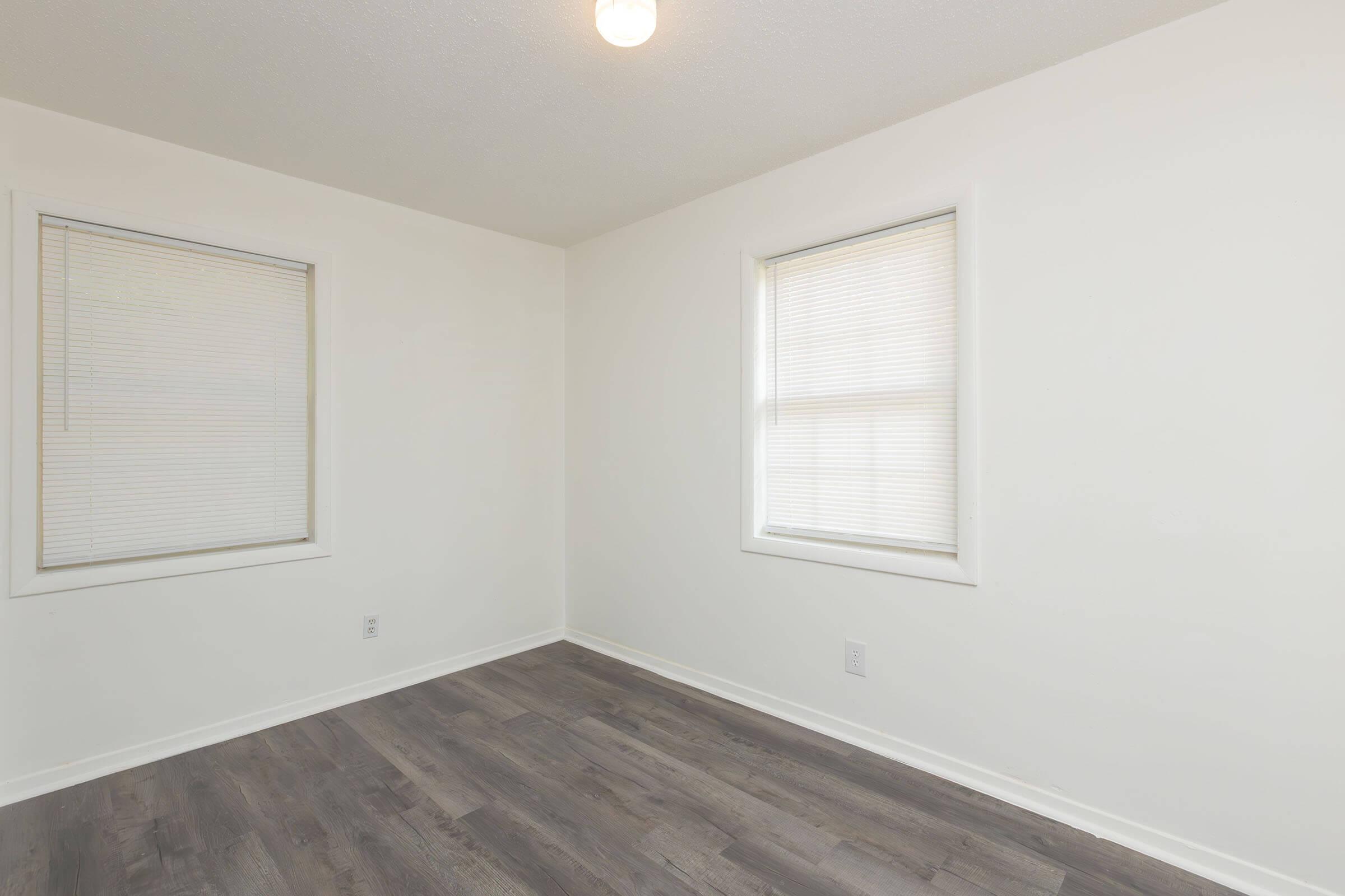 a room with a sink and a window