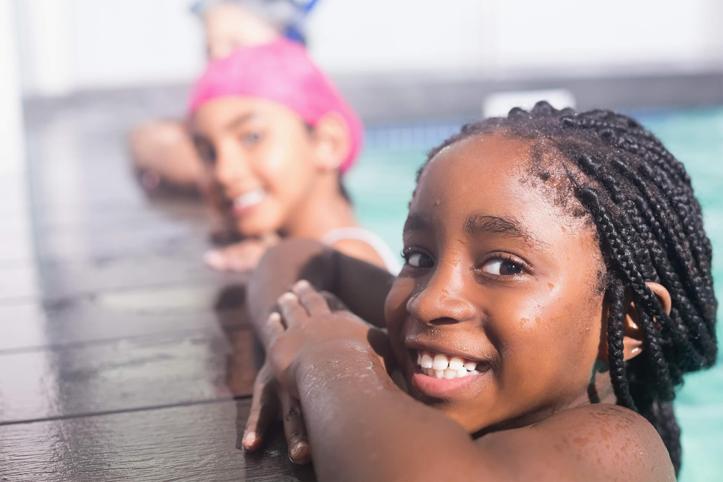 kids at pools edge - iStock-524428673_super.jpg
