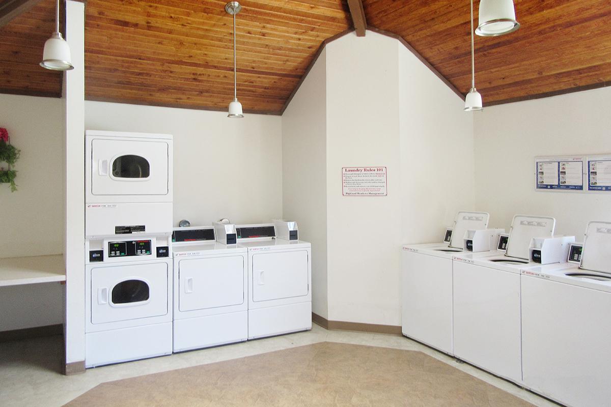 a white refrigerator freezer sitting inside of a kitchen