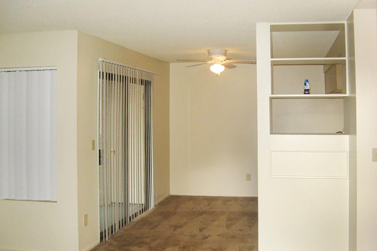 a white refrigerator freezer sitting in a room