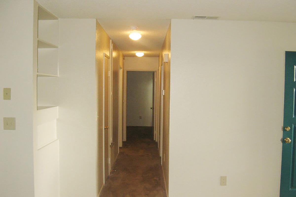 a white refrigerator freezer sitting inside of a building