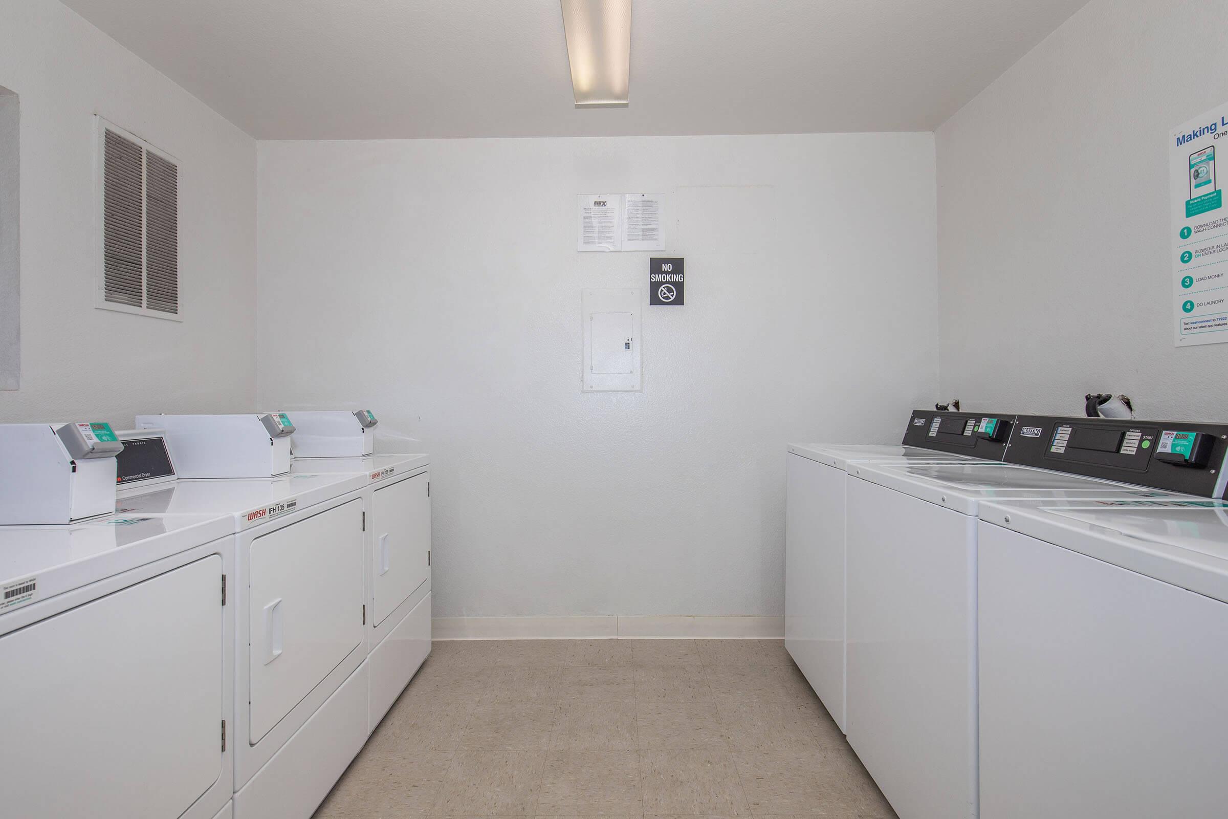 a kitchen with a sink and a refrigerator