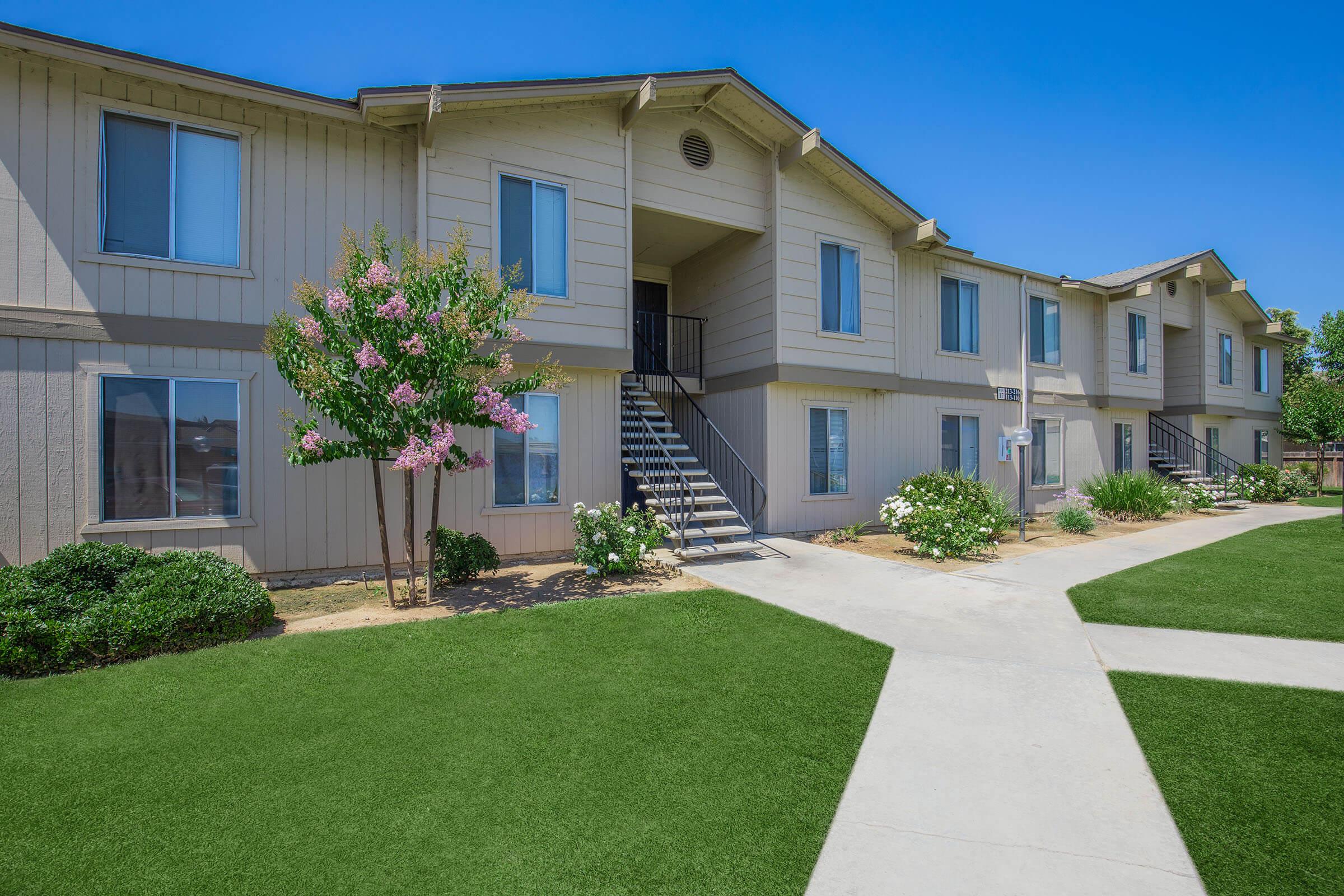 a large lawn in front of a house