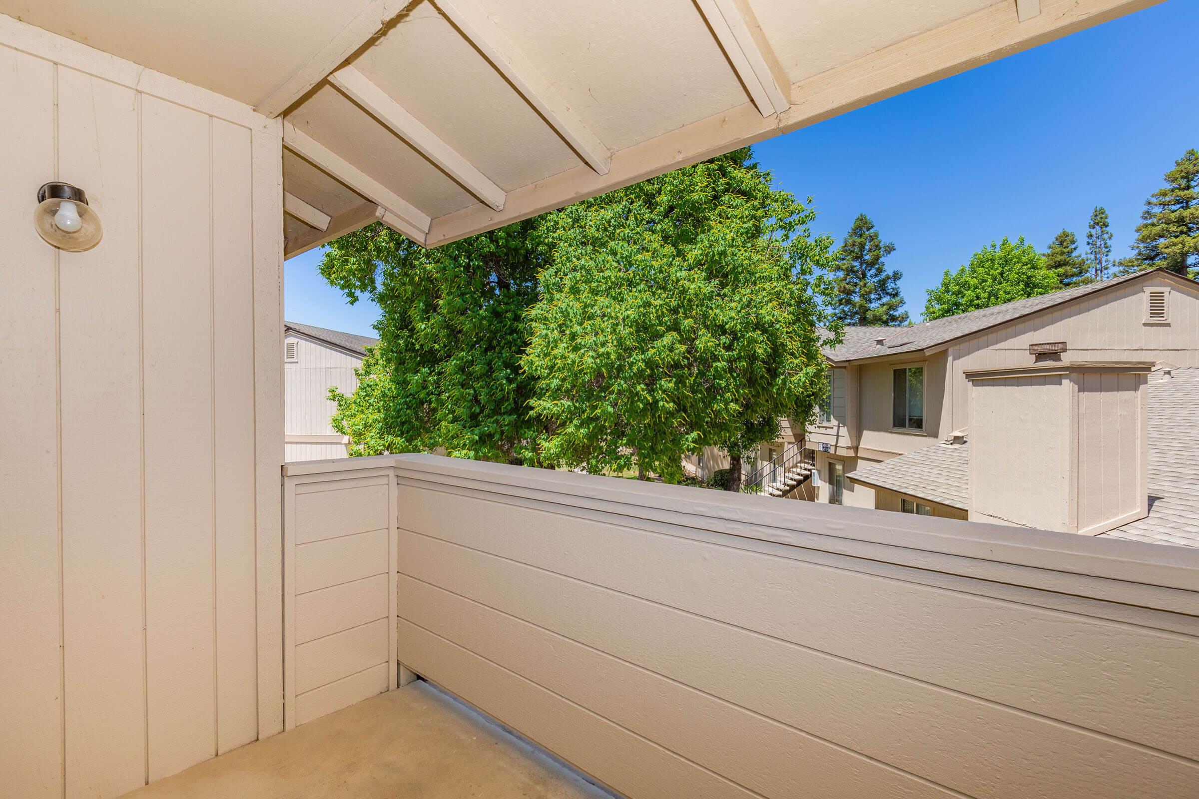 a house with trees in the background