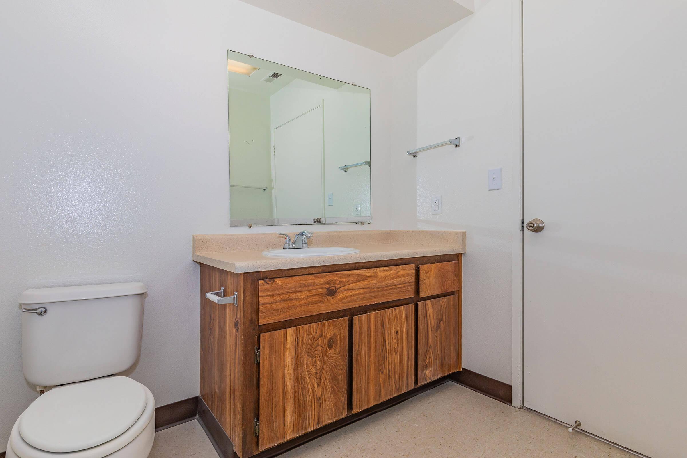 a close up of a sink in a small room