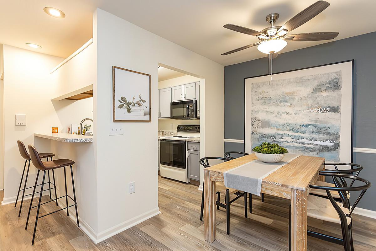 a room filled with furniture and a table