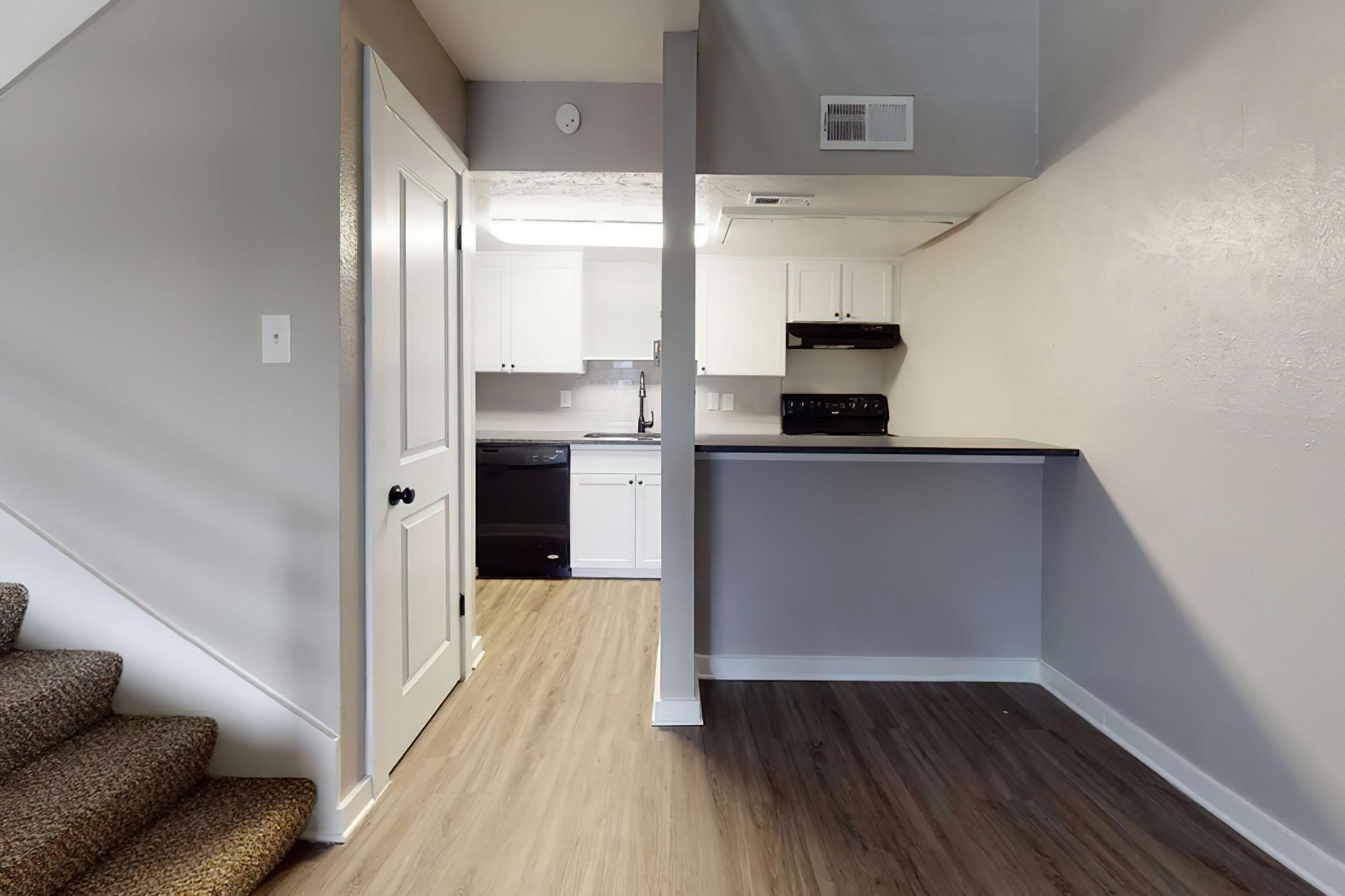 a stainless steel refrigerator in a room