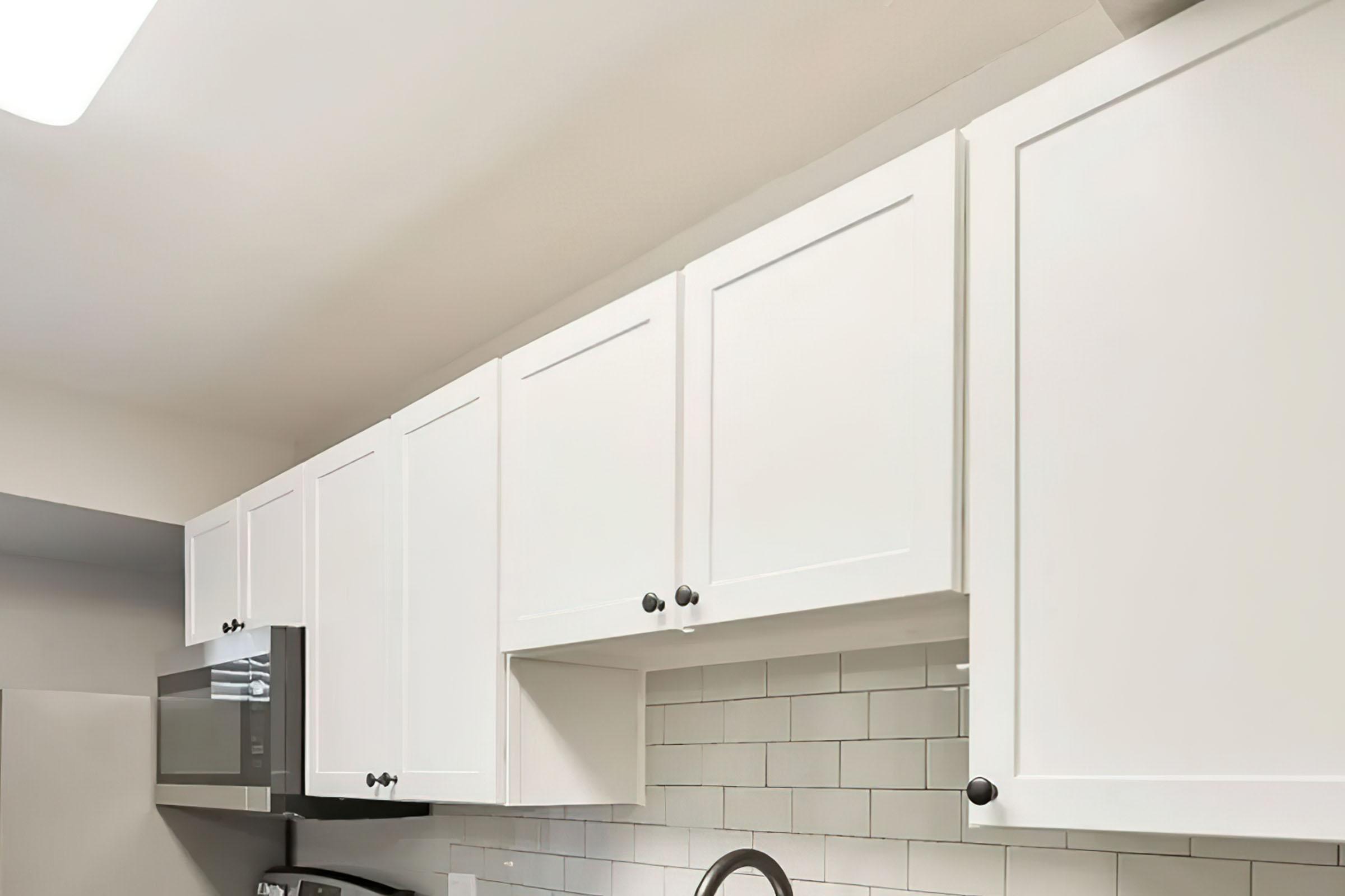 a kitchen with a stove and a refrigerator