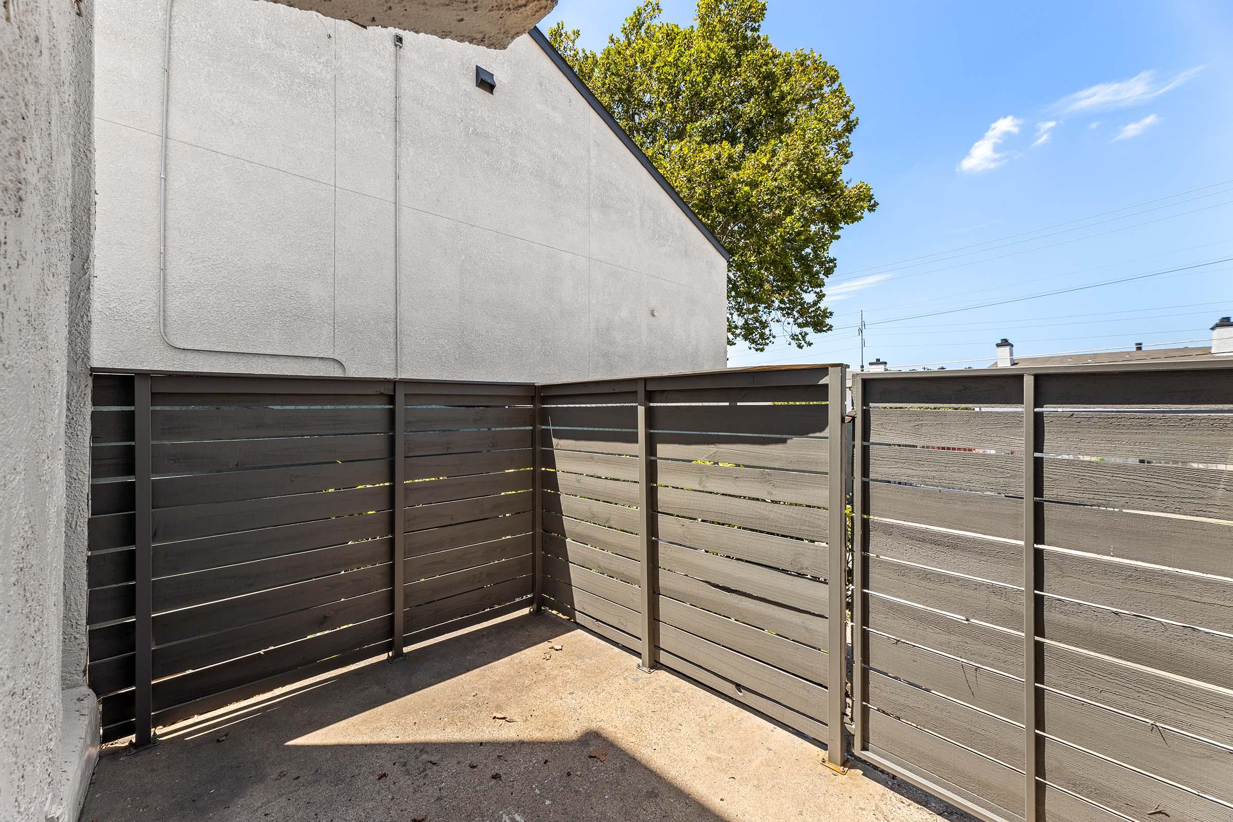 a building with a metal fence