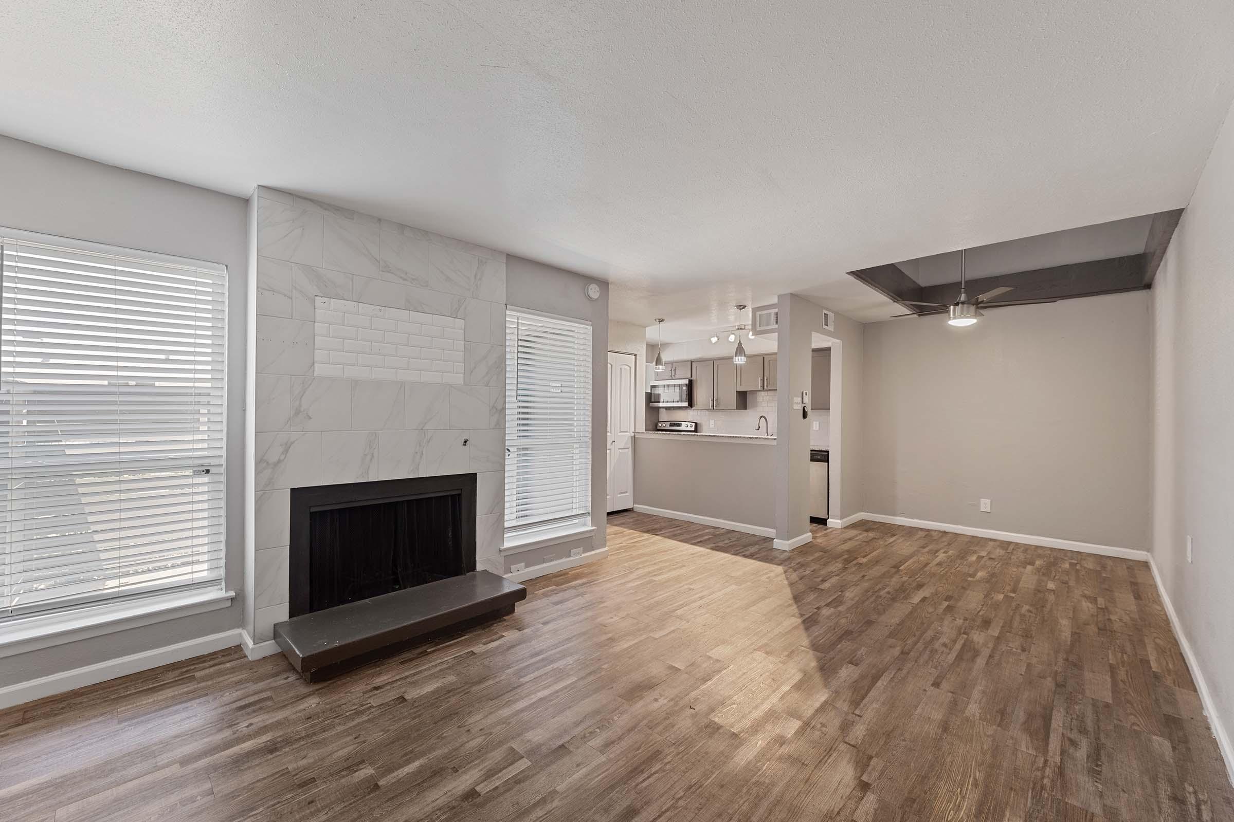 a room filled with furniture and a large window