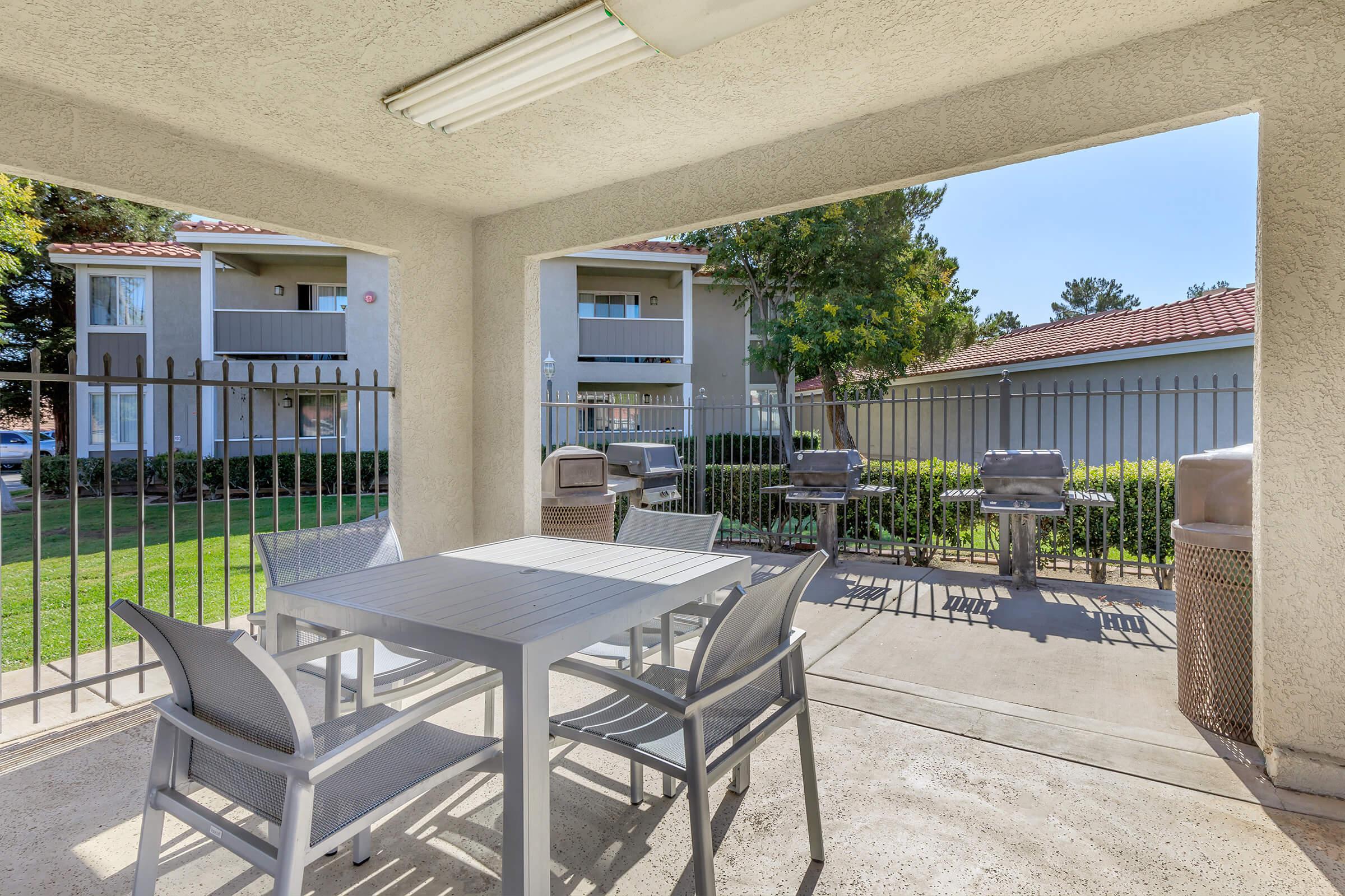 a dining room table in front of a building