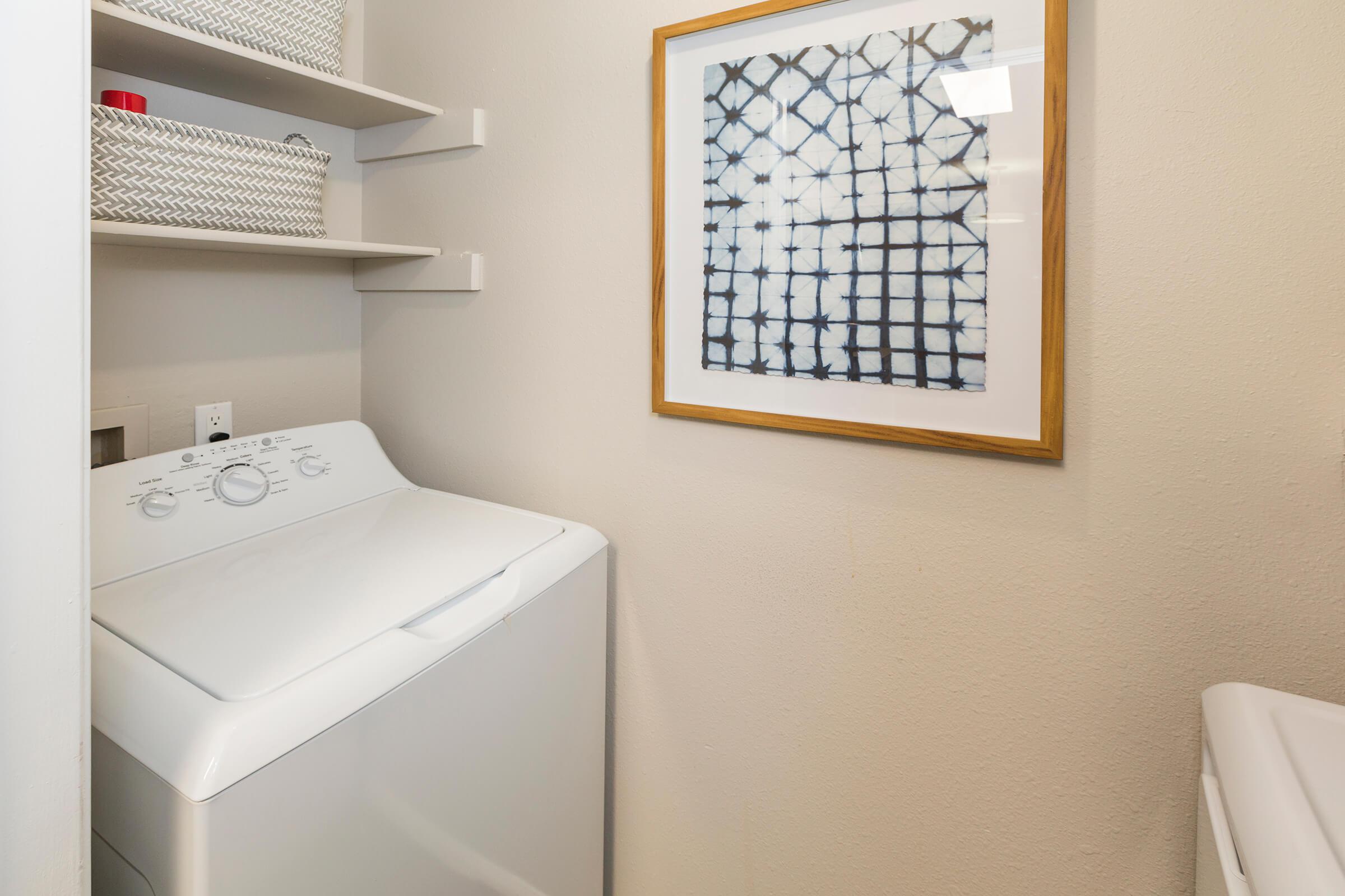 a white refrigerator freezer sitting next to a sink