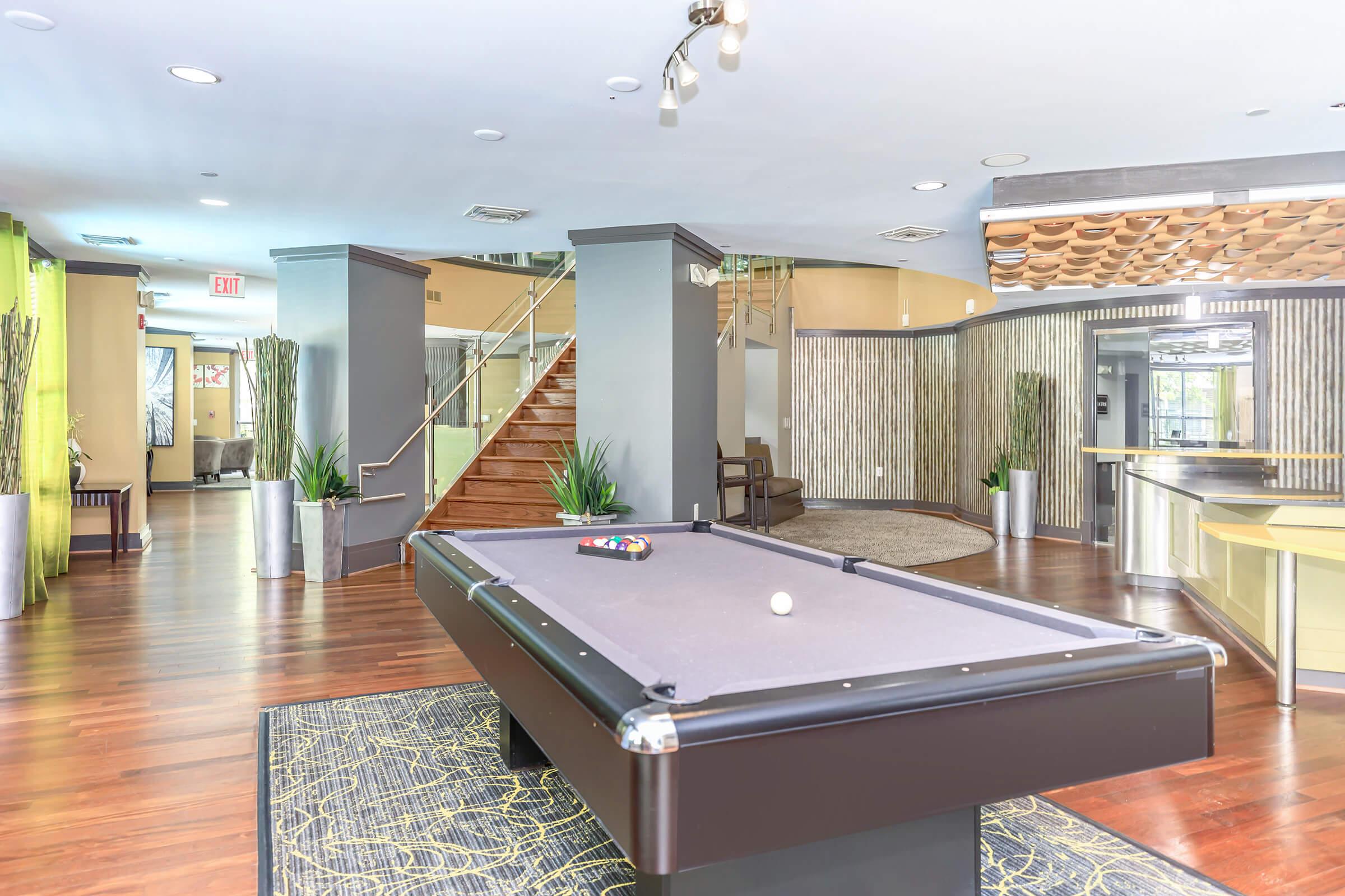 a living room with a wooden floor