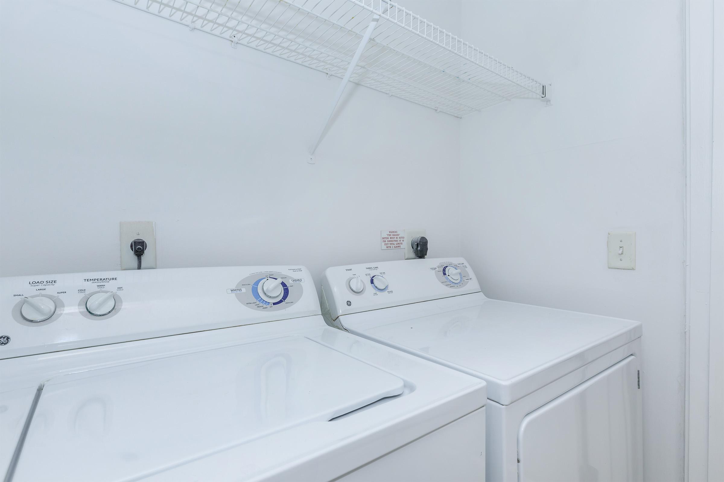 Laundry Room at Emerson at Cherry Lane Apartments in Laurel, MD