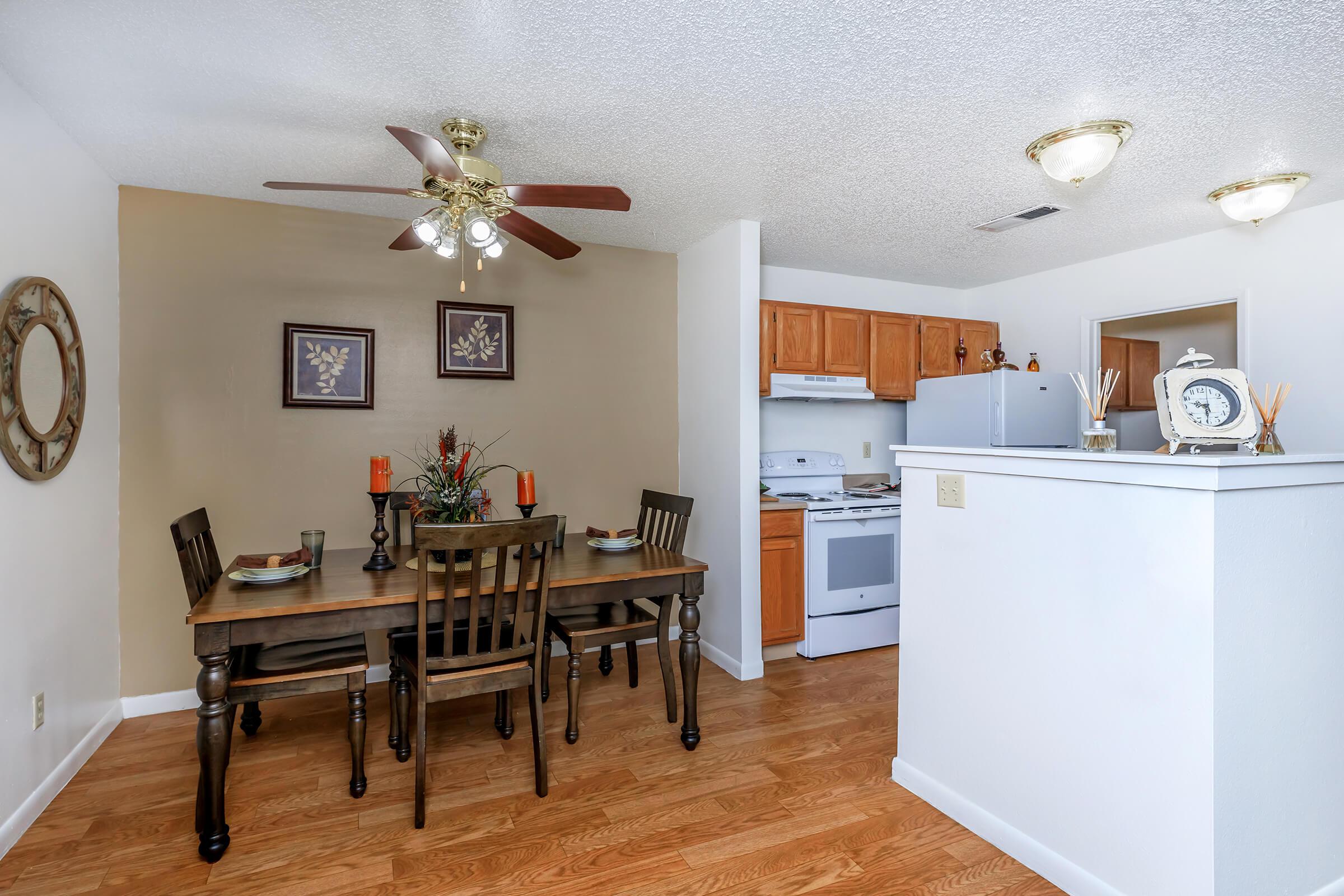 dining room with a ceiling fan