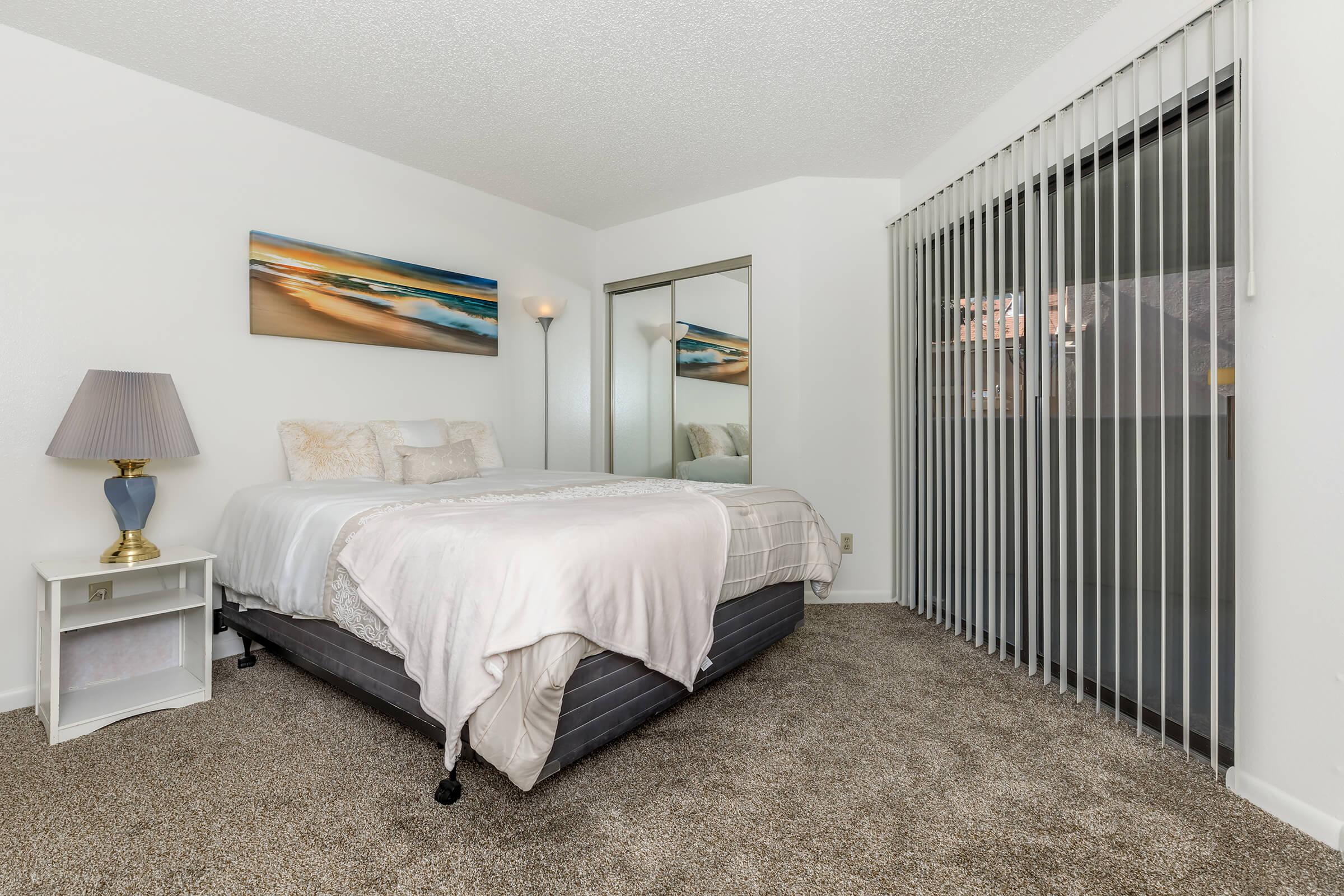 bedroom with sliding glass doors