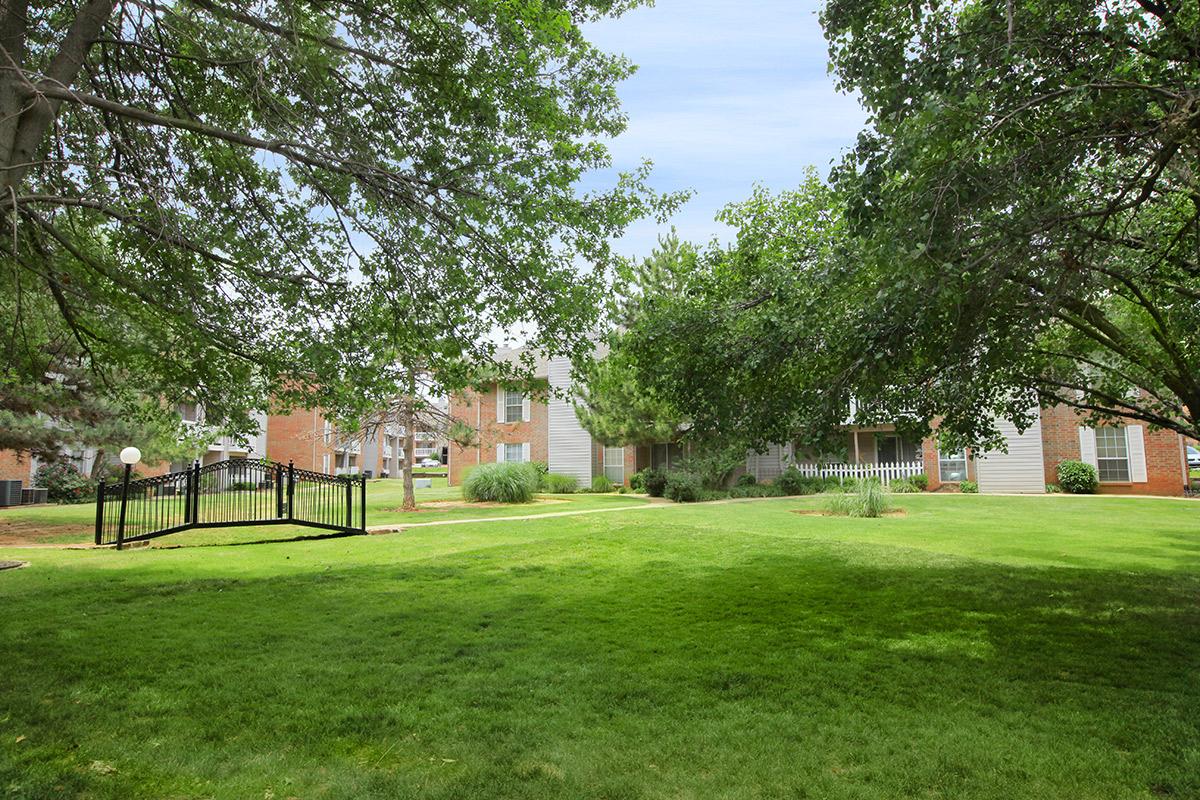 a tree in front of a house