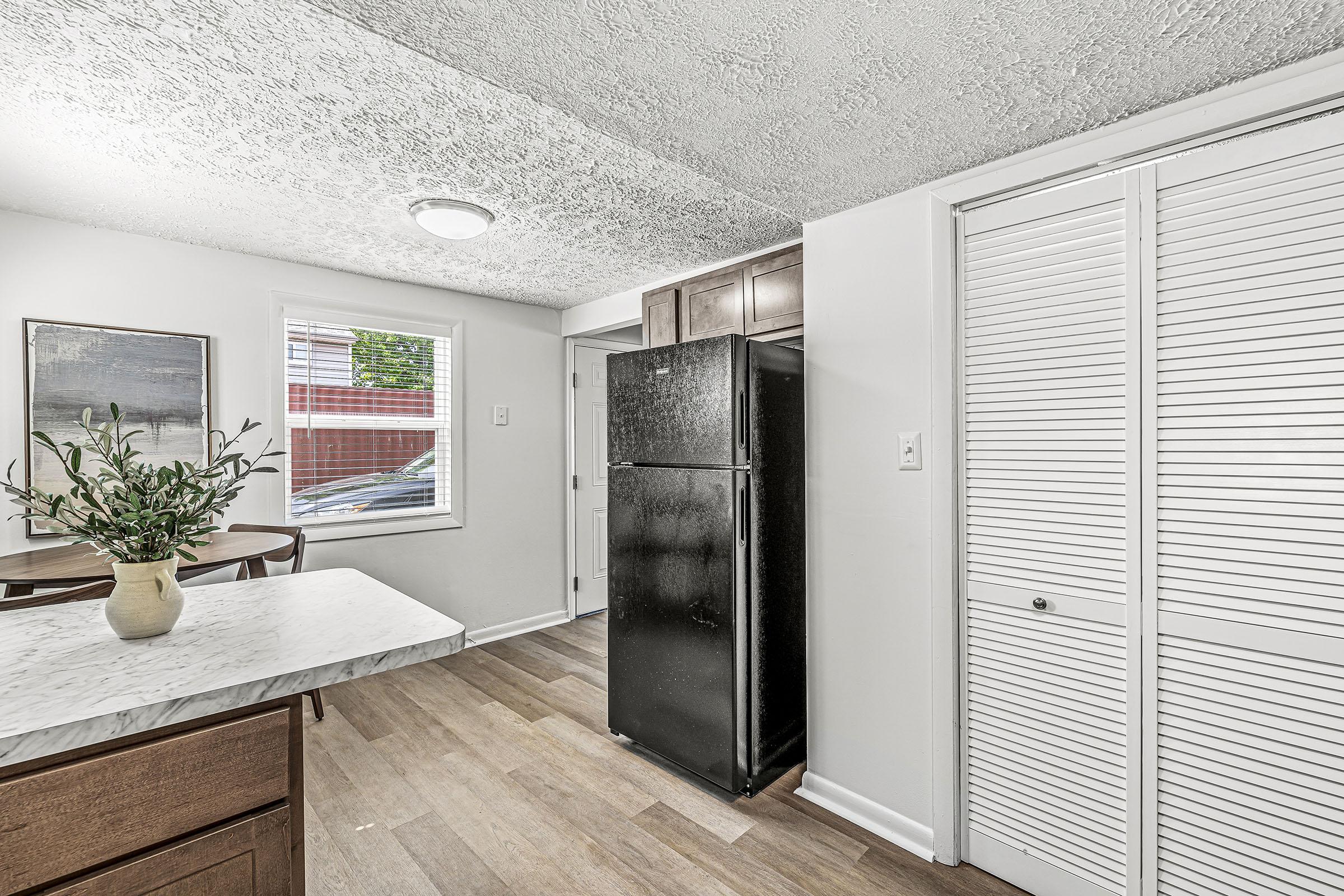 a kitchen with a sink and a window