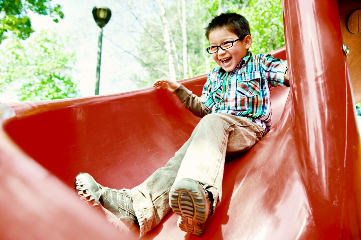 boy on red slide.jpg