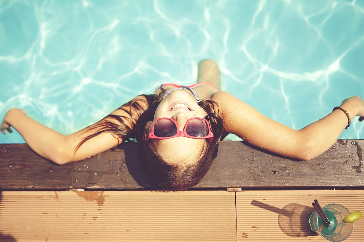 girl relaxing at pool.jpg